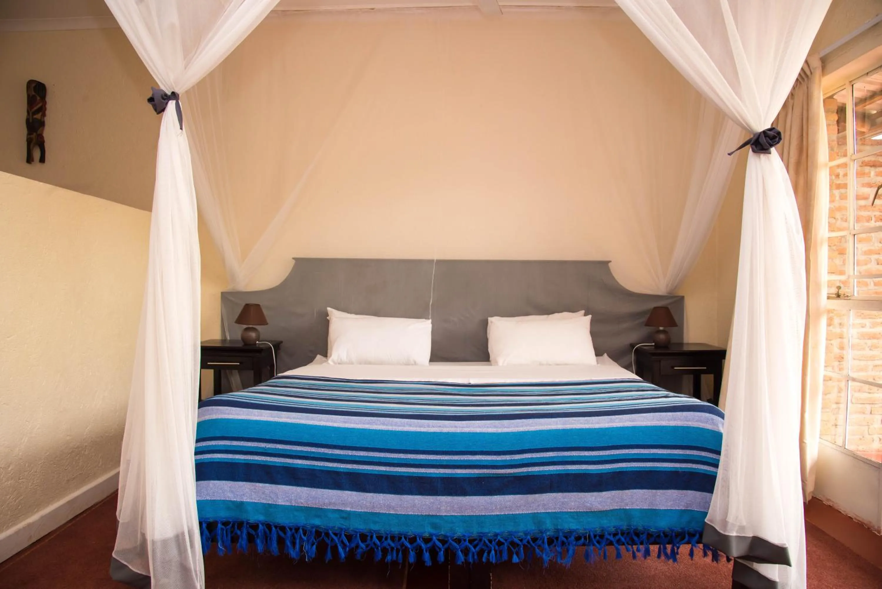 Bed in Game Haven Lodge