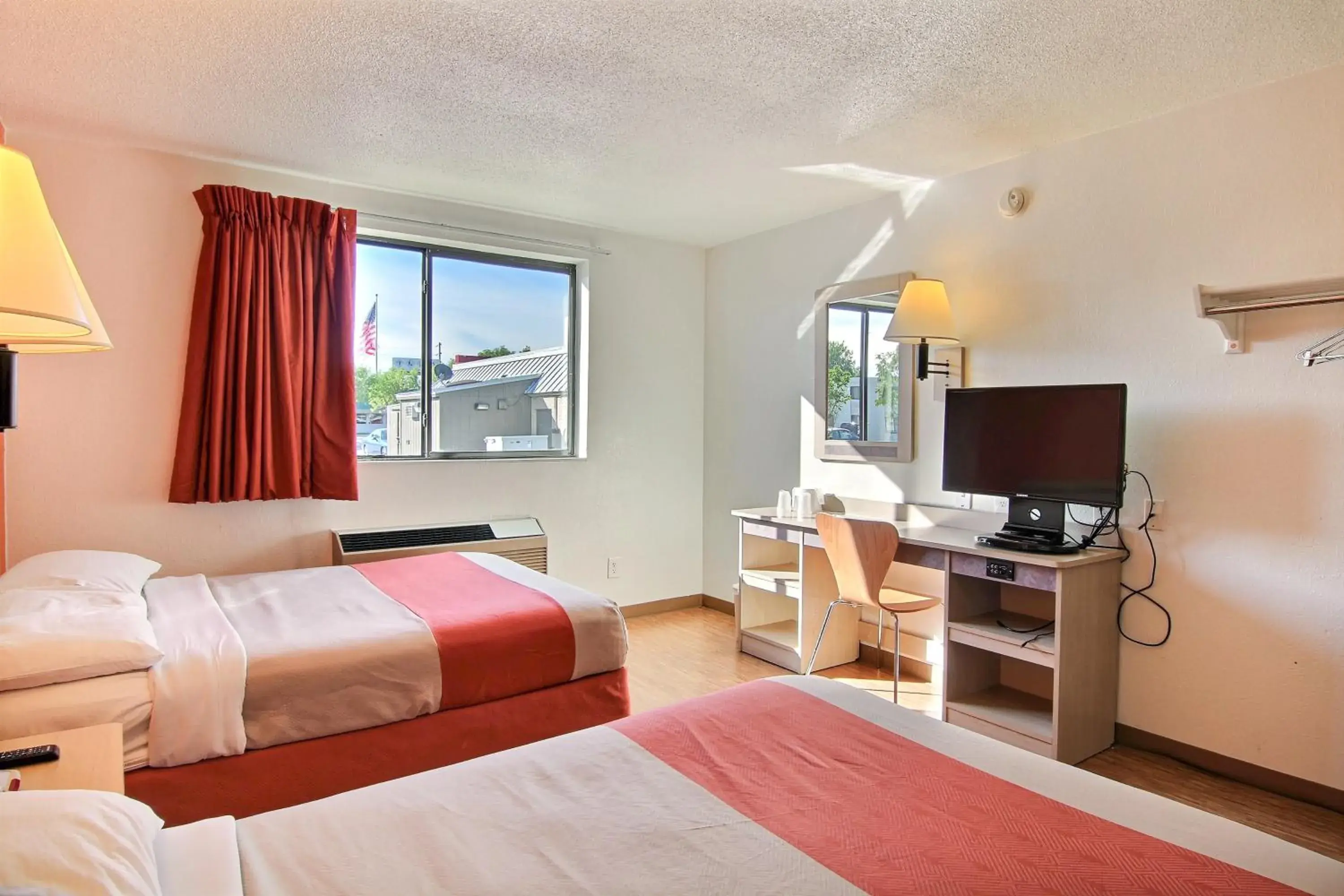 Photo of the whole room, TV/Entertainment Center in Motel 6-Fargo, ND - West Acres - North Fargo