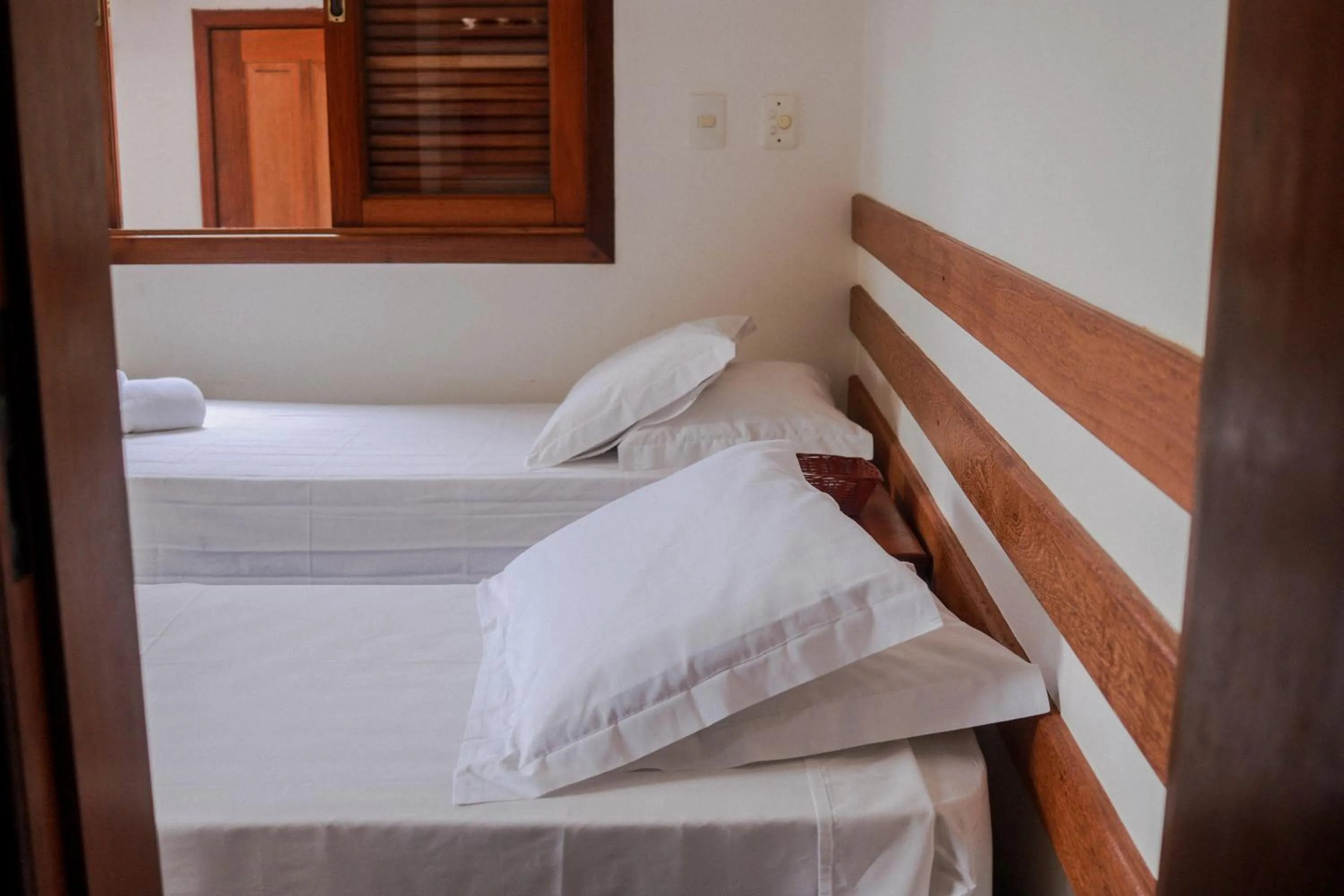 Bed in Pousada Maria Farinha