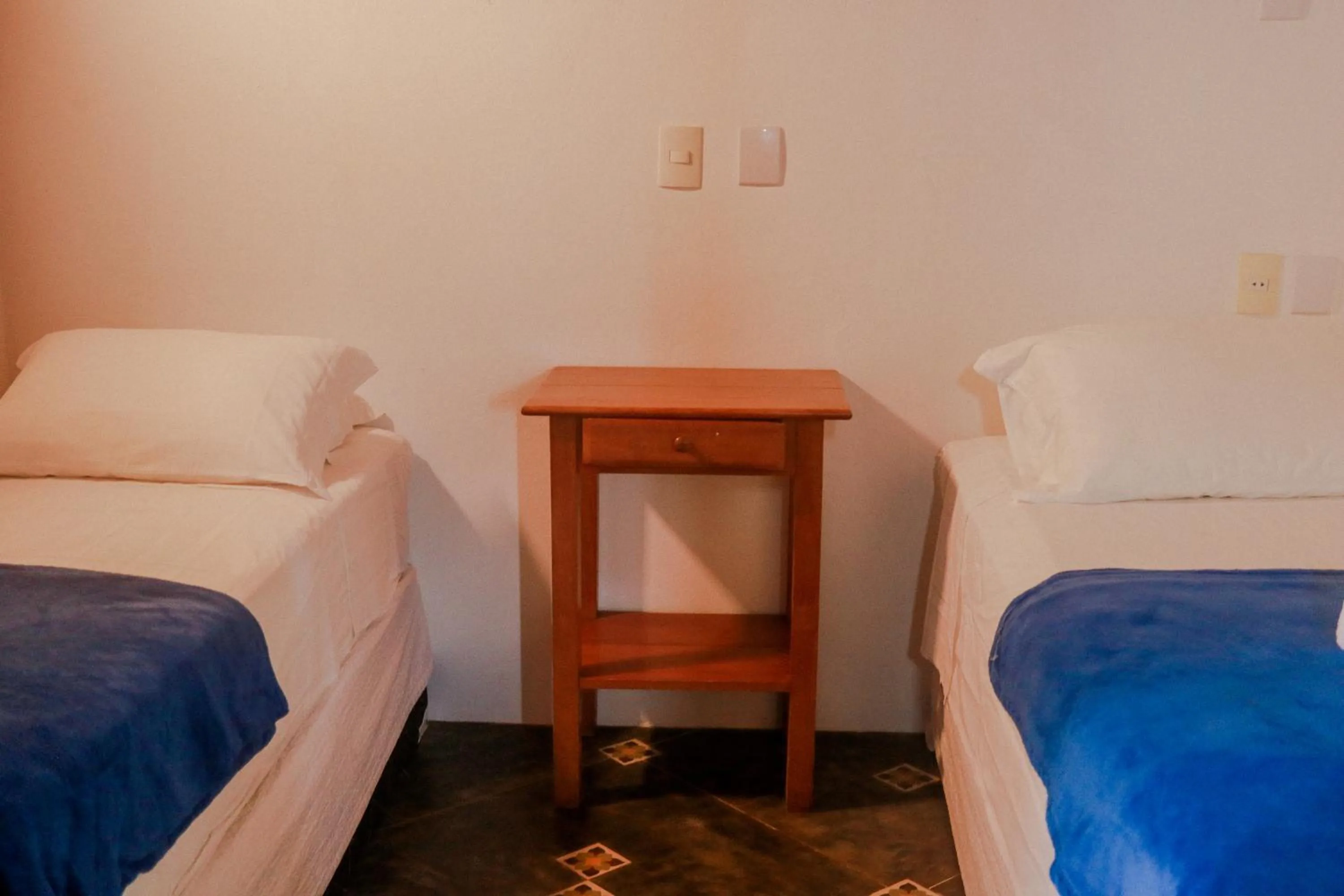 Bed in Pousada Maria Farinha