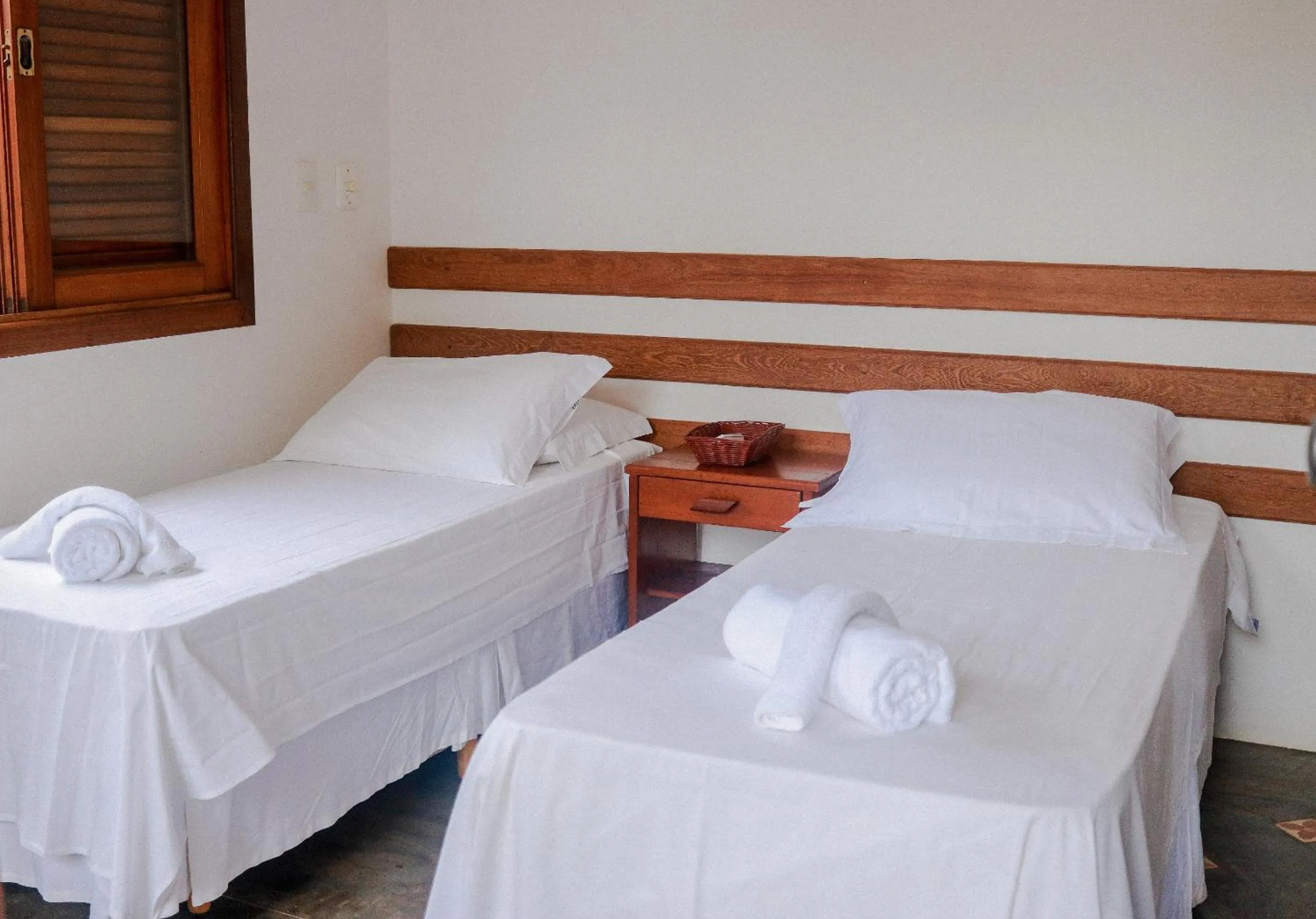 Bed in Pousada Maria Farinha