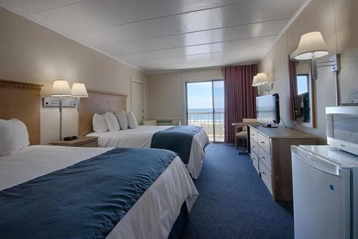 Bed in Flamingo Motel