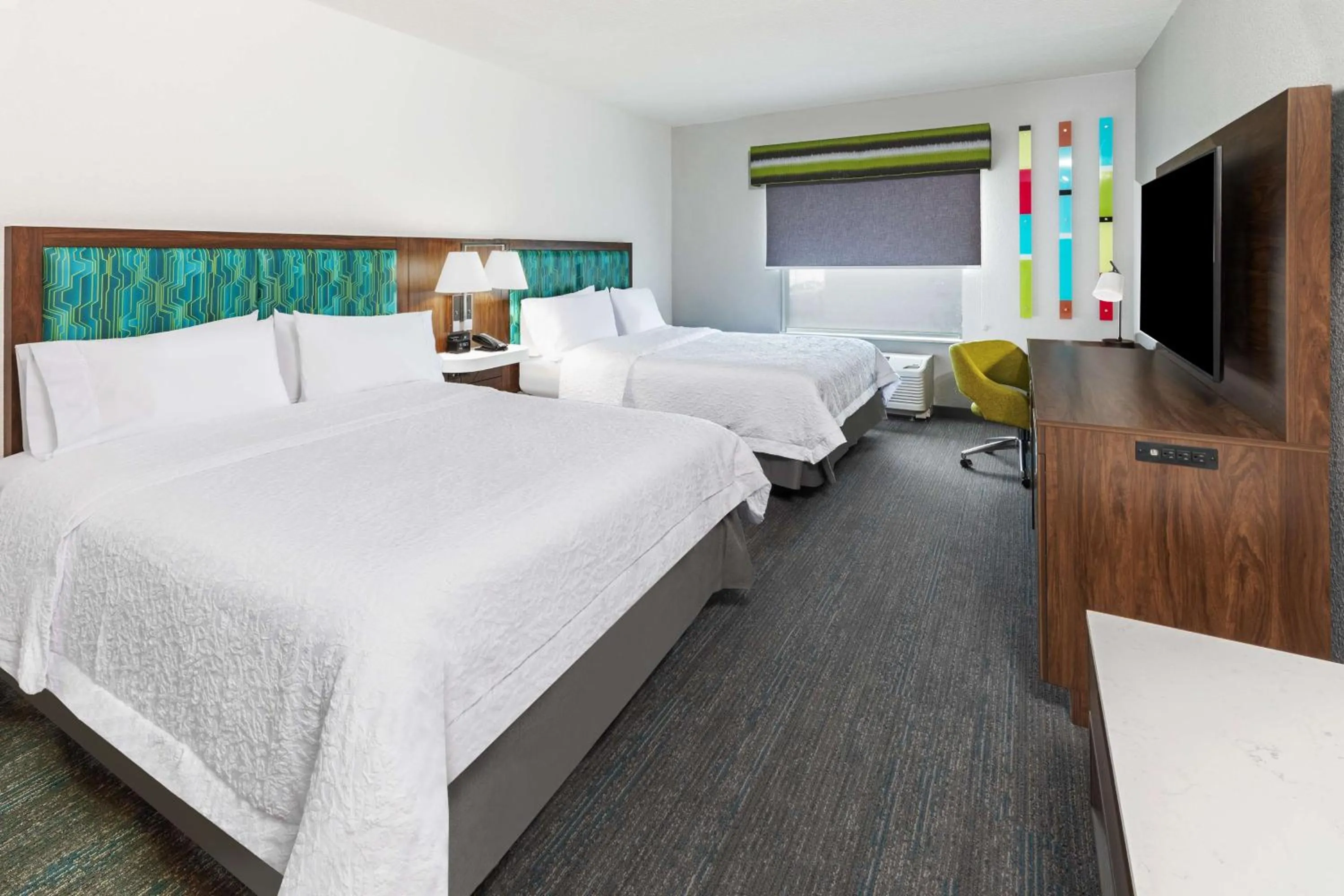 Bed in Hampton Inn & Suites Dallas I-30 Cockrell Hill, Tx