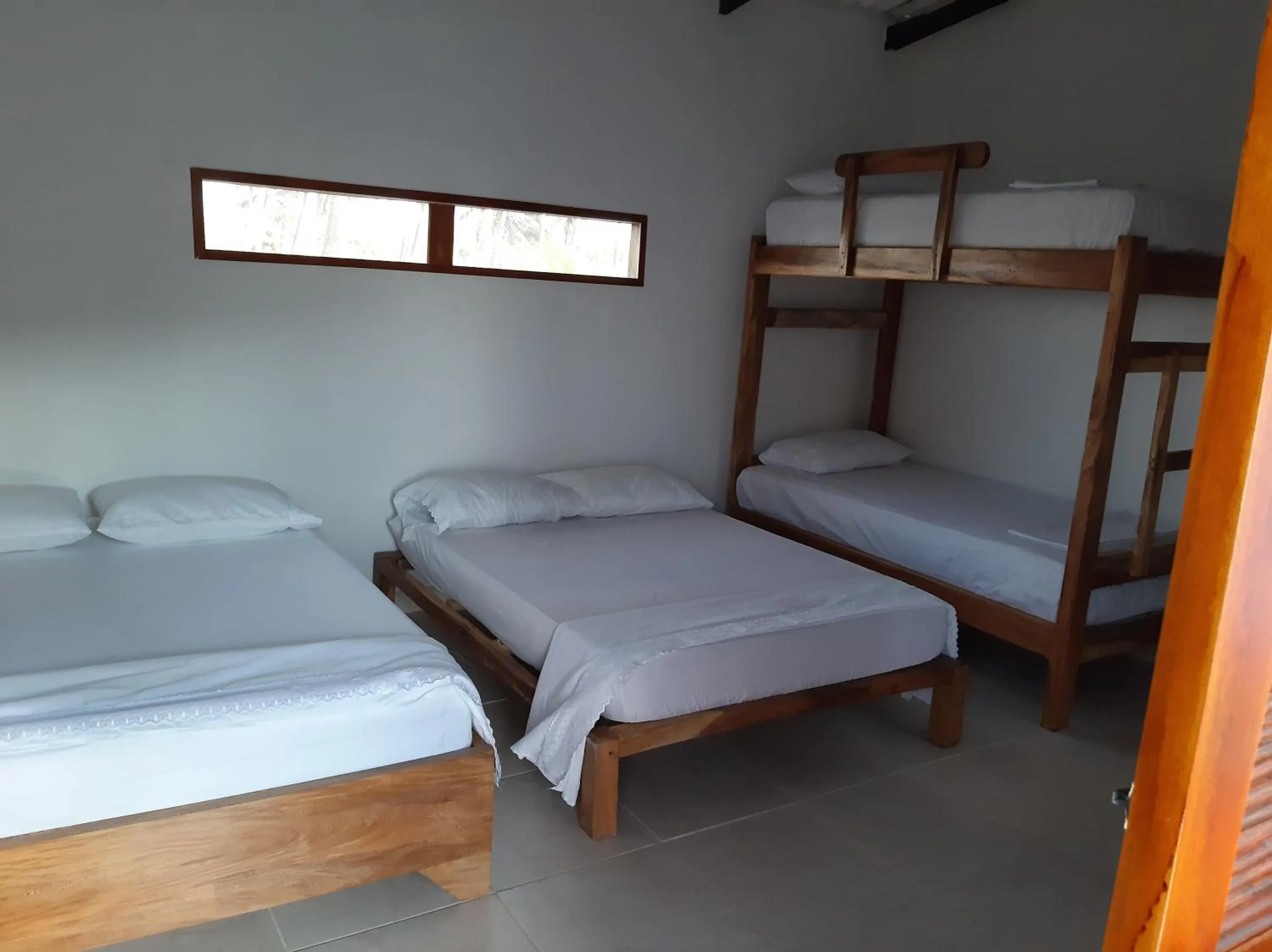 Bed in Ecohotel Kocoluu