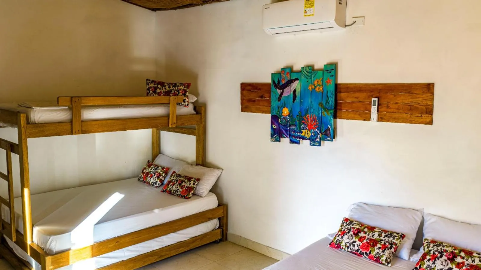 Bed in Ecohotel Kocoluu