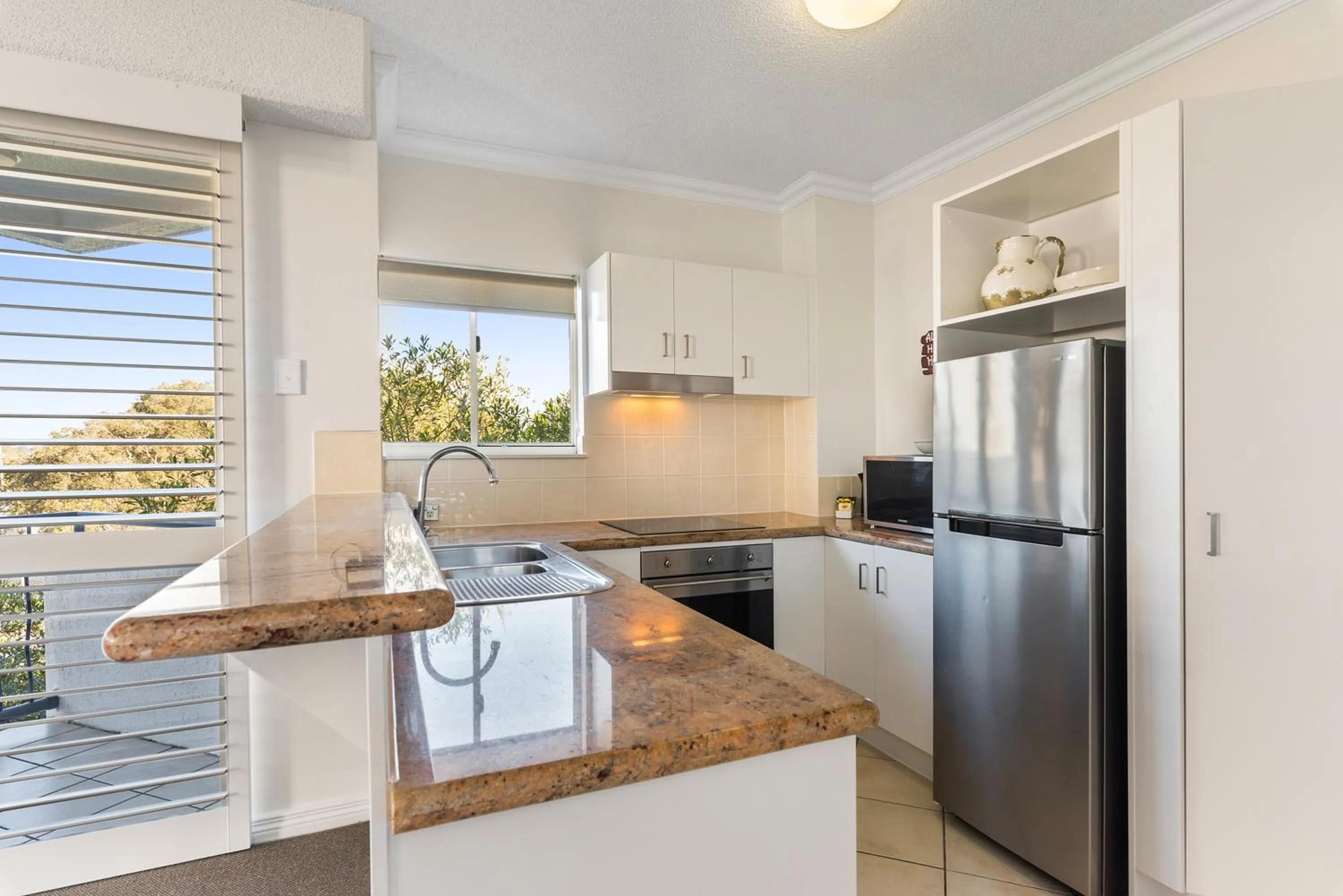 Kitchen or kitchenette in Raffles Mooloolaba