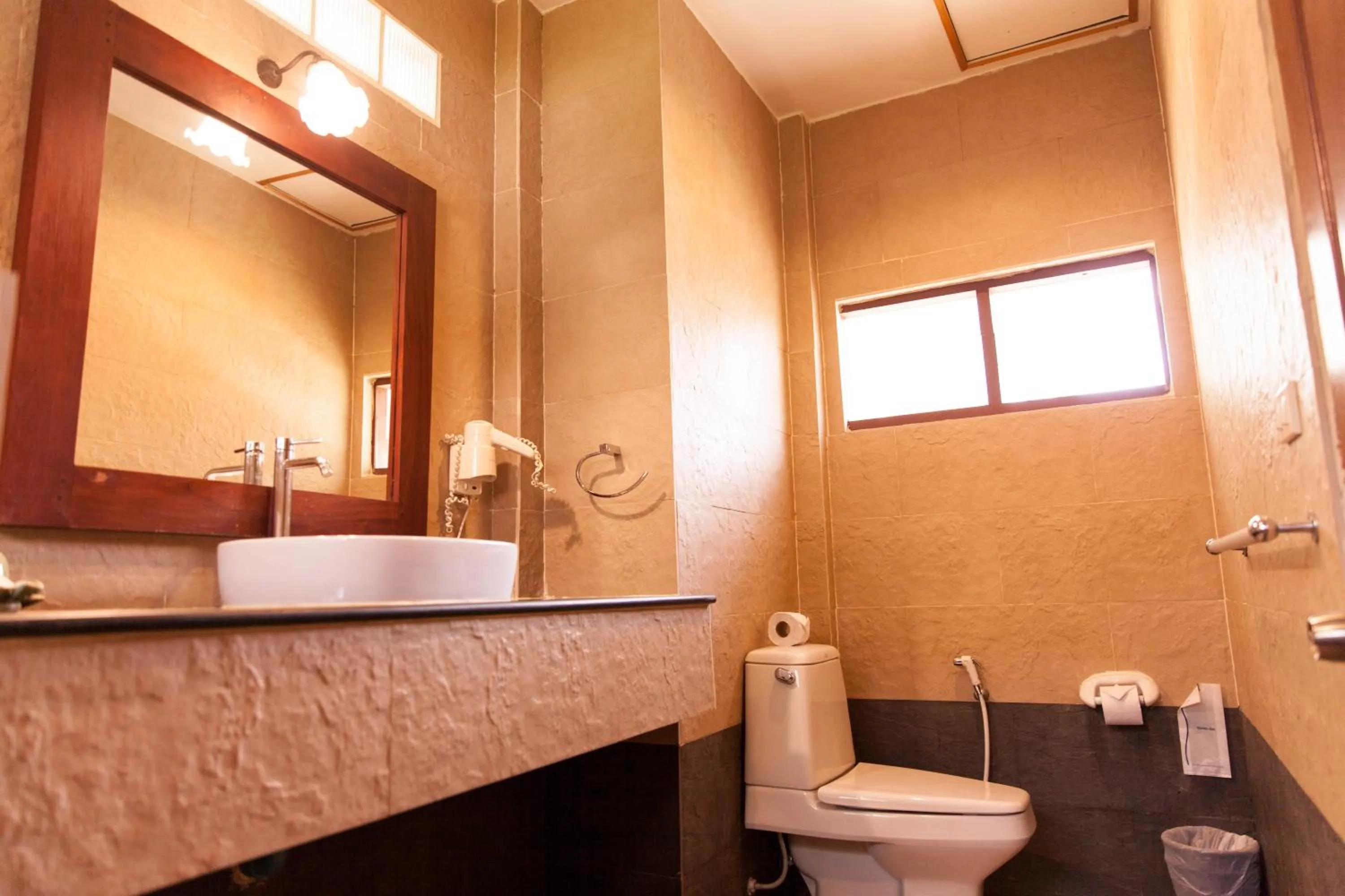Toilet in Coco Palm Beach Resort - SHA Extra Plus