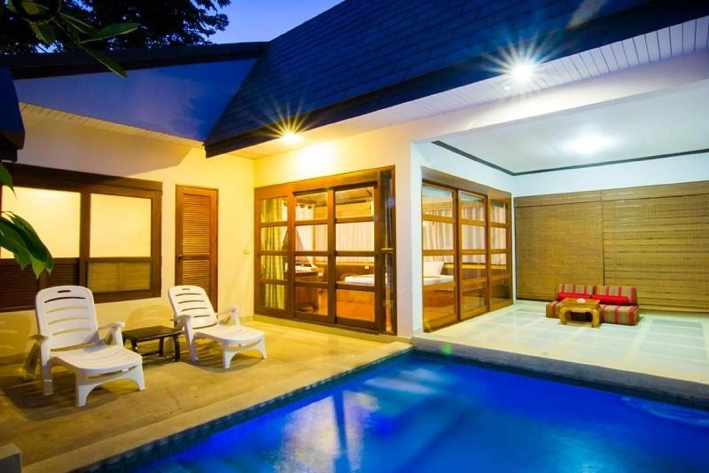 Swimming pool in Coco Palm Beach Resort - SHA Extra Plus