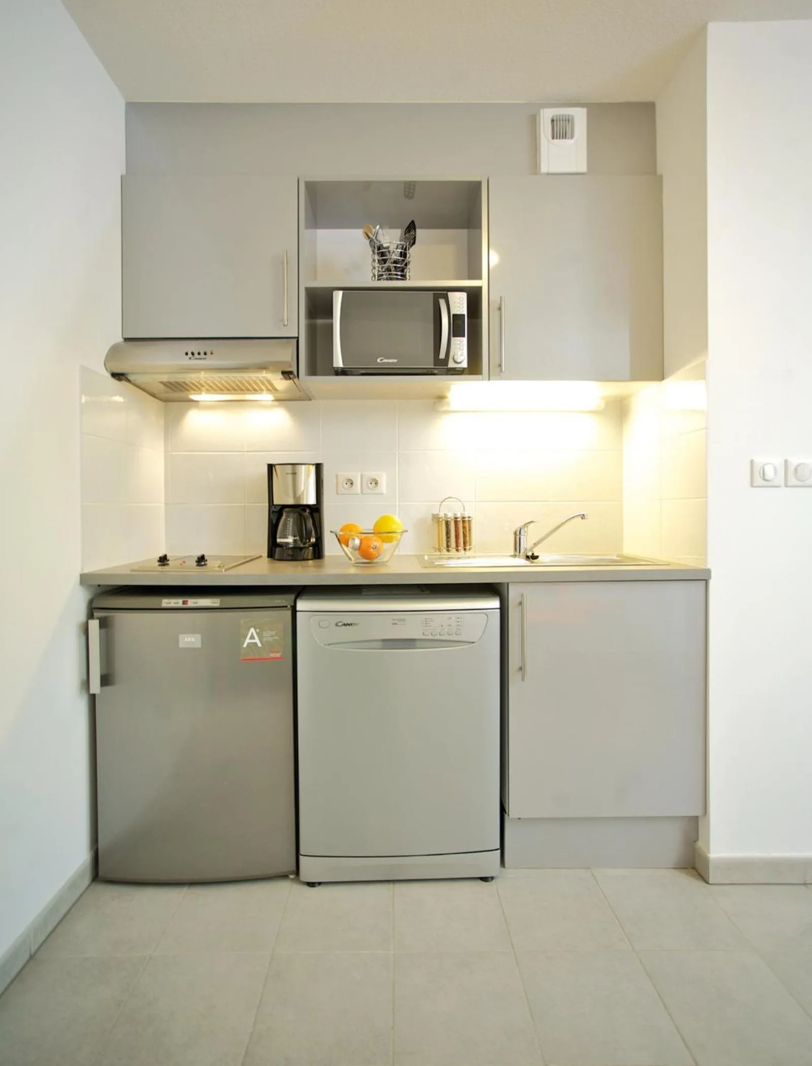 Kitchen or kitchenette in Lagrange Aparthotel Montpellier Millénaire