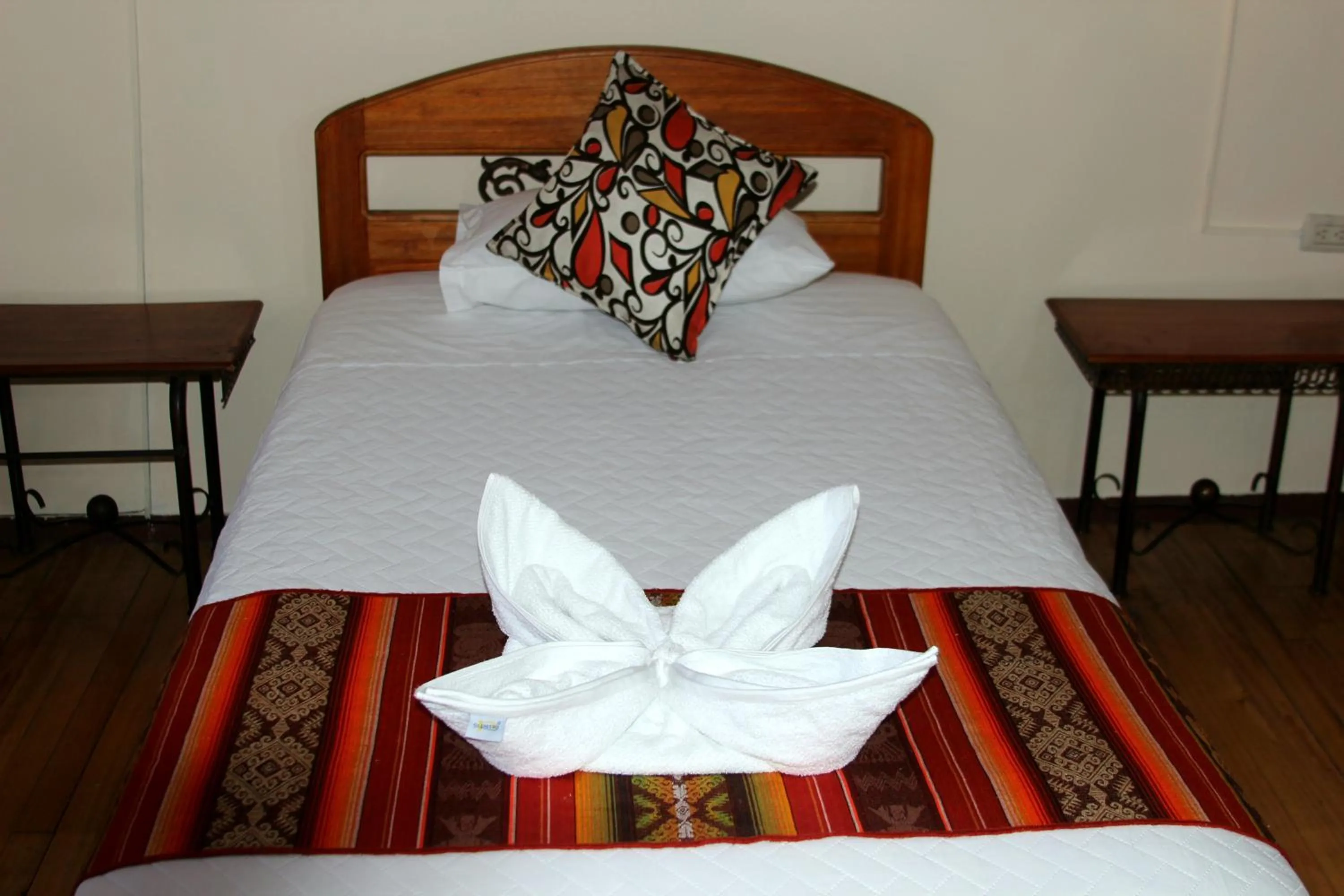 Bed in Mía Leticia B&B