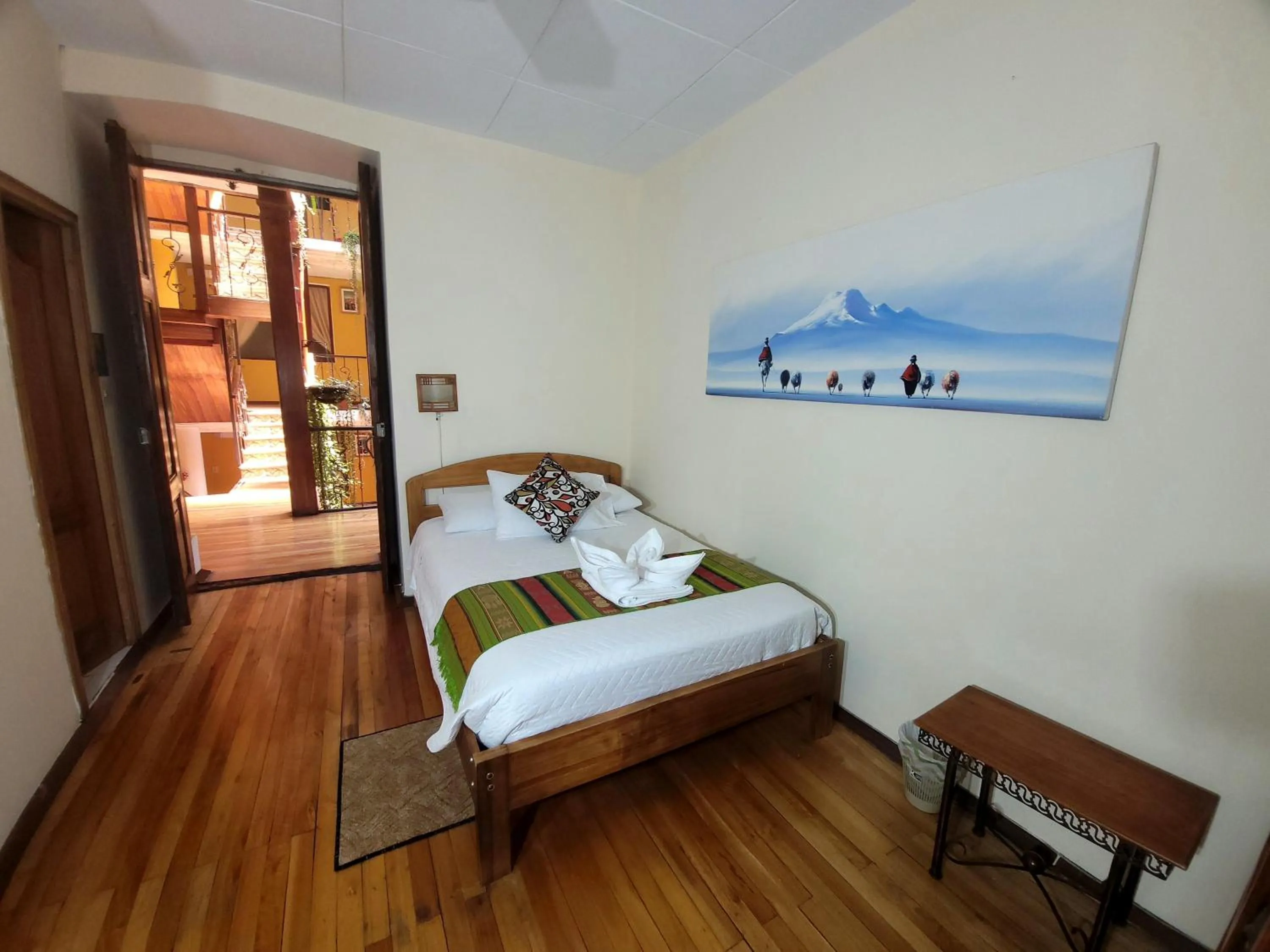 Bed in Mía Leticia B&B