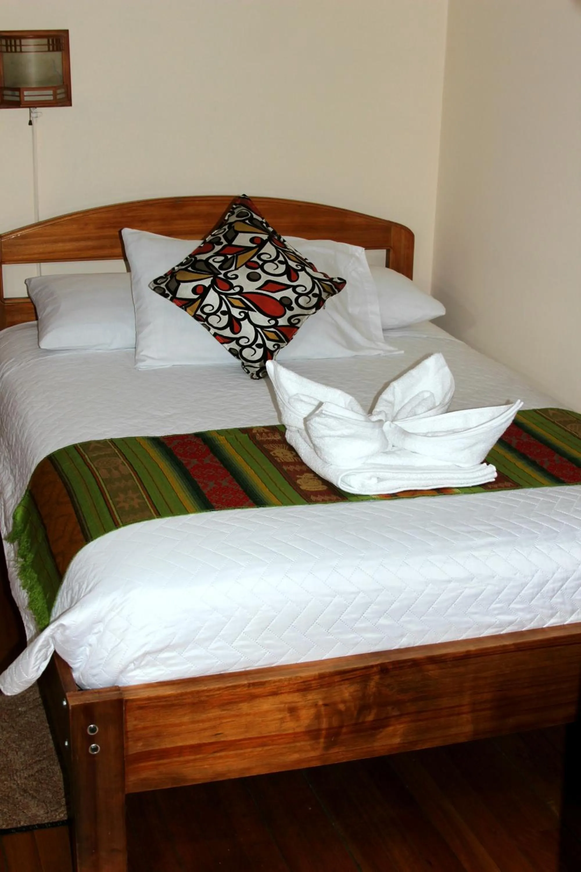 Bed in Mía Leticia B&B