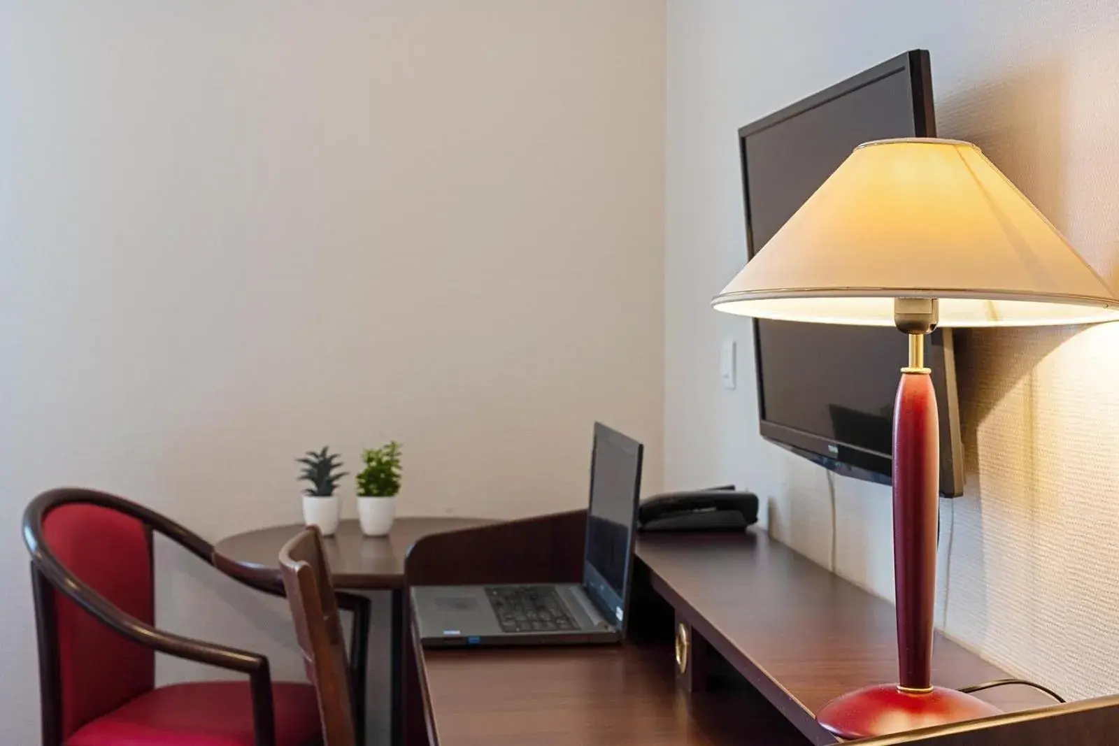 Bedroom in Appart'City Classic Montelimar Bedroom in Appart'City Classic Montelimar