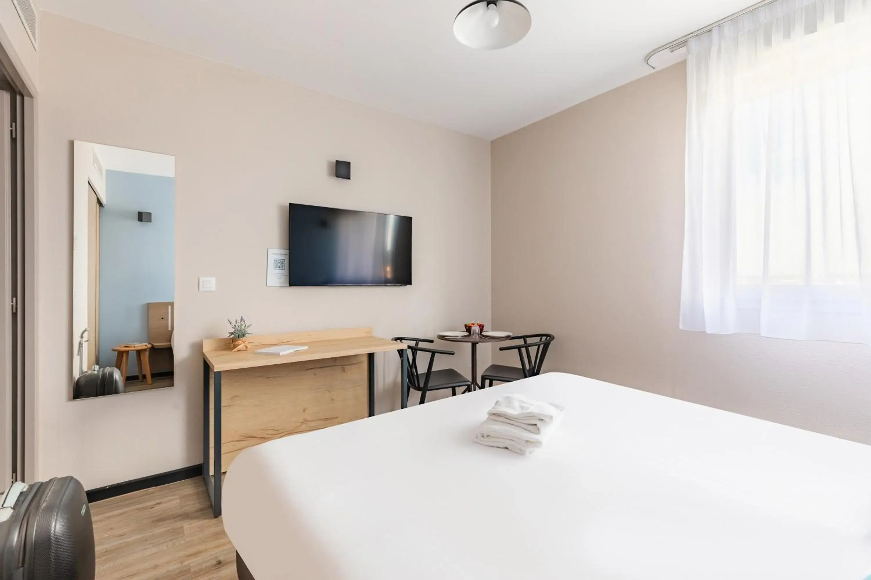 Bed in Appart'City Classic Montelimar Bed in Appart'City Classic Montelimar