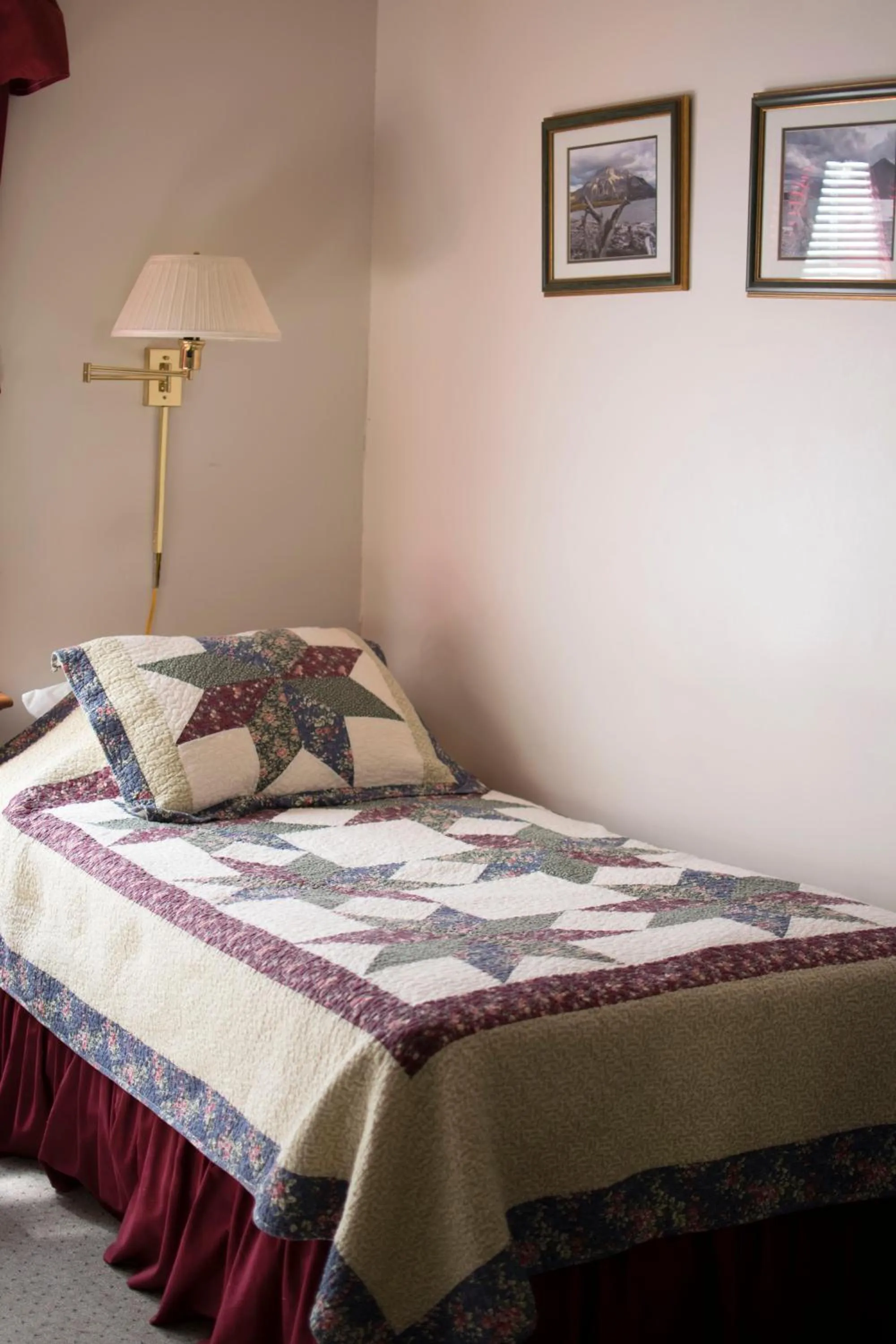 Bed in Crandell Mountain Lodge