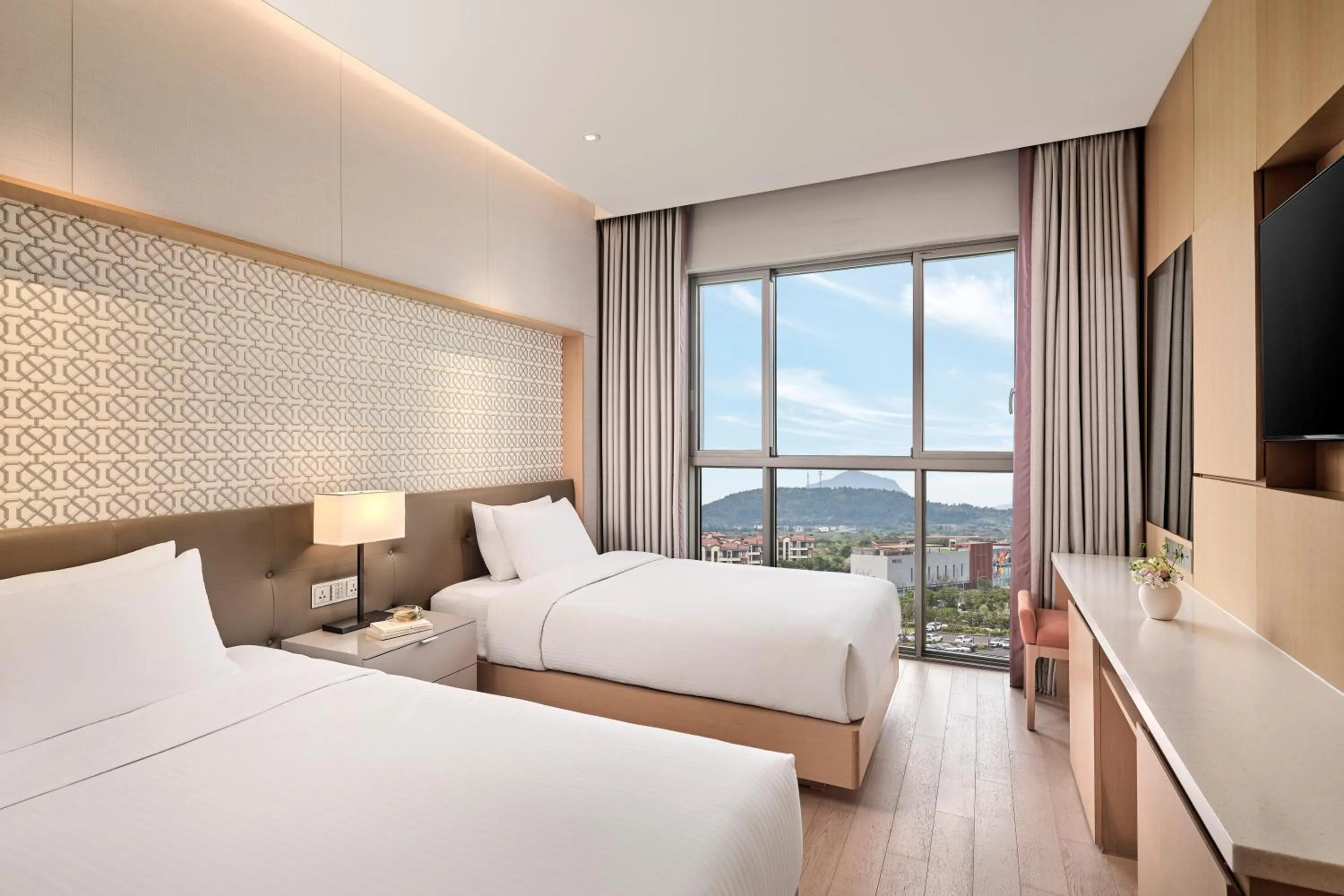 Bed in Landing Jeju Shinhwa World Hotel