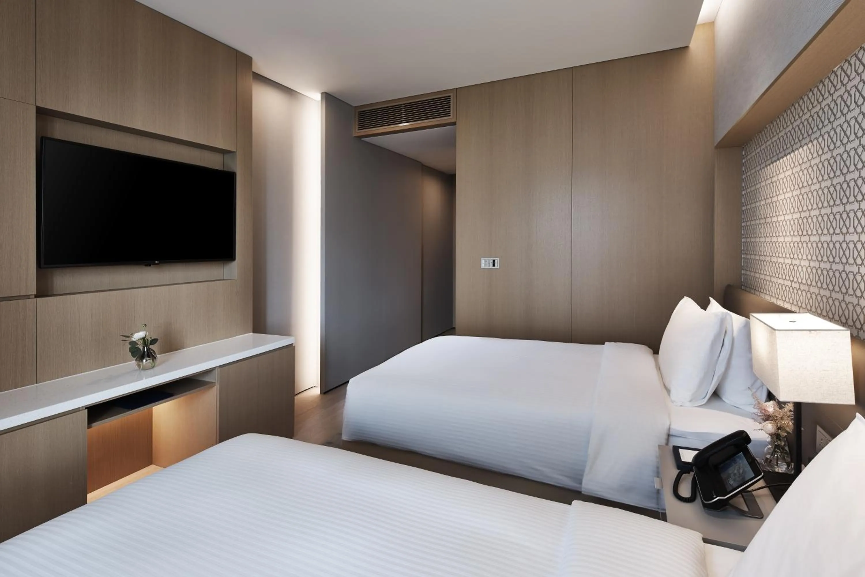 Bed in Landing Jeju Shinhwa World Hotel