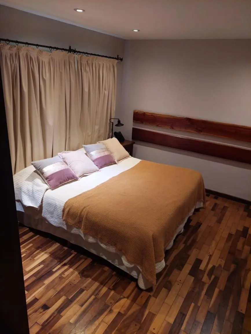 Bed in Río Arriba Suites & Apartments & Restó