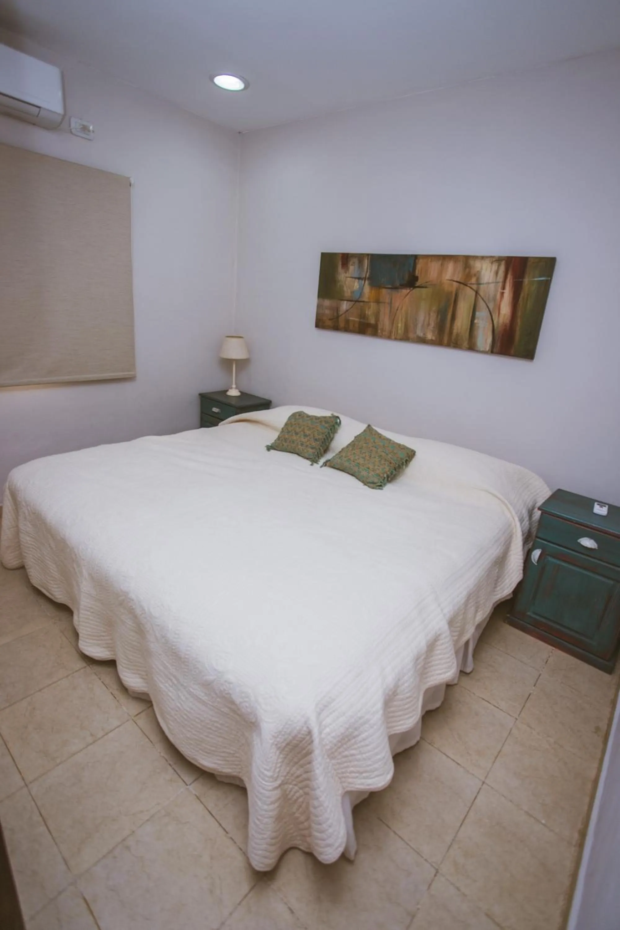 Bed in Río Arriba Suites & Apartments & Restó