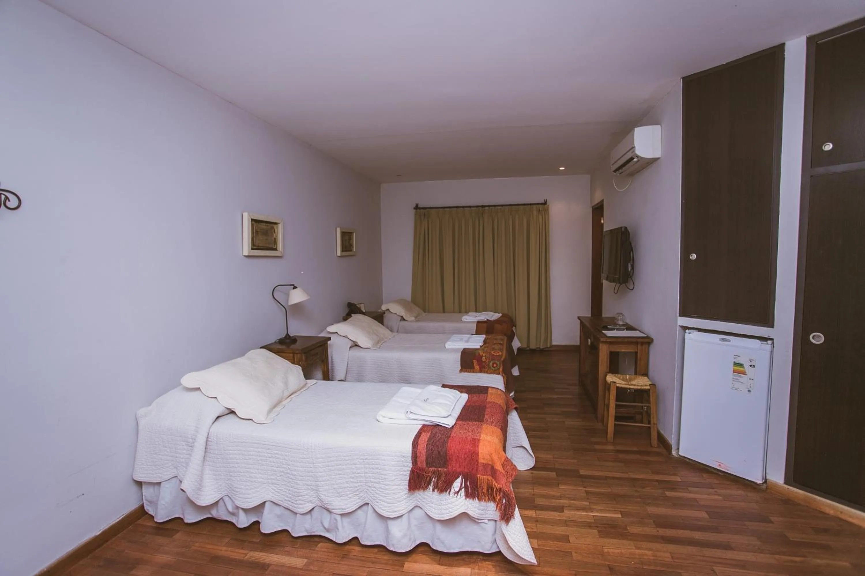 Bed in Río Arriba Suites & Apartments & Restó