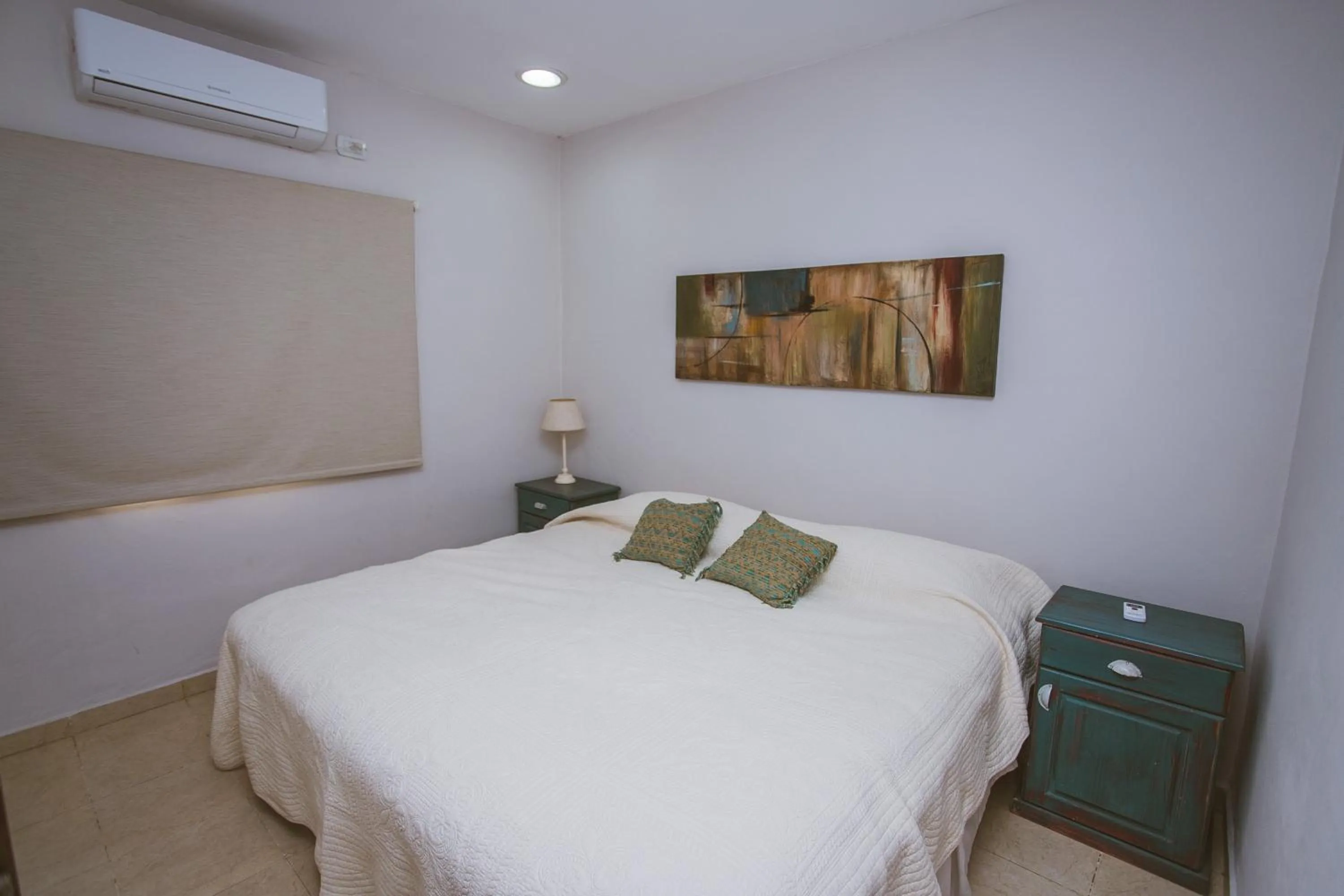 Bed in Río Arriba Suites & Apartments & Restó