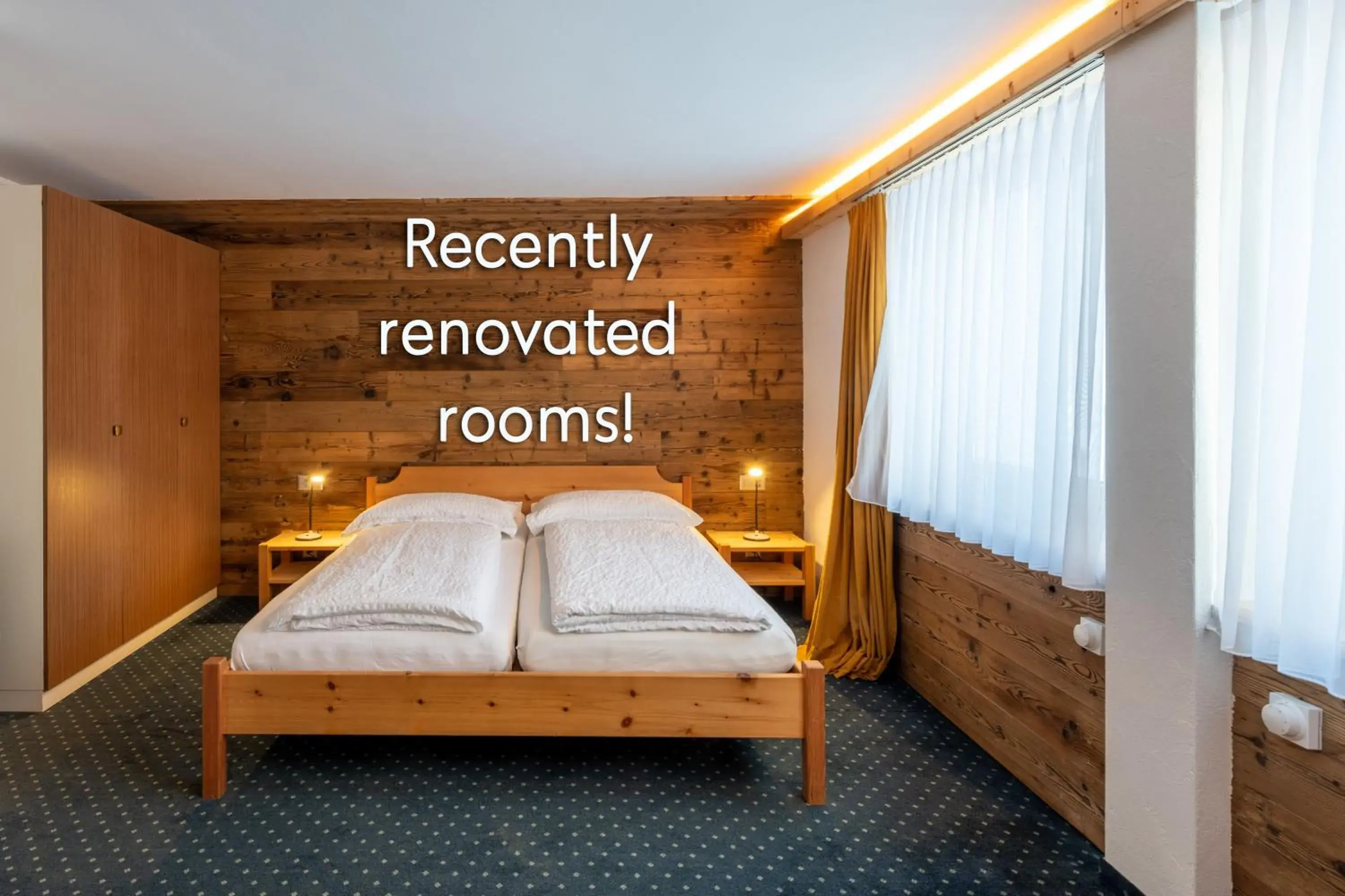 Bed in Hotel Grischuna Bed in Hotel Grischuna