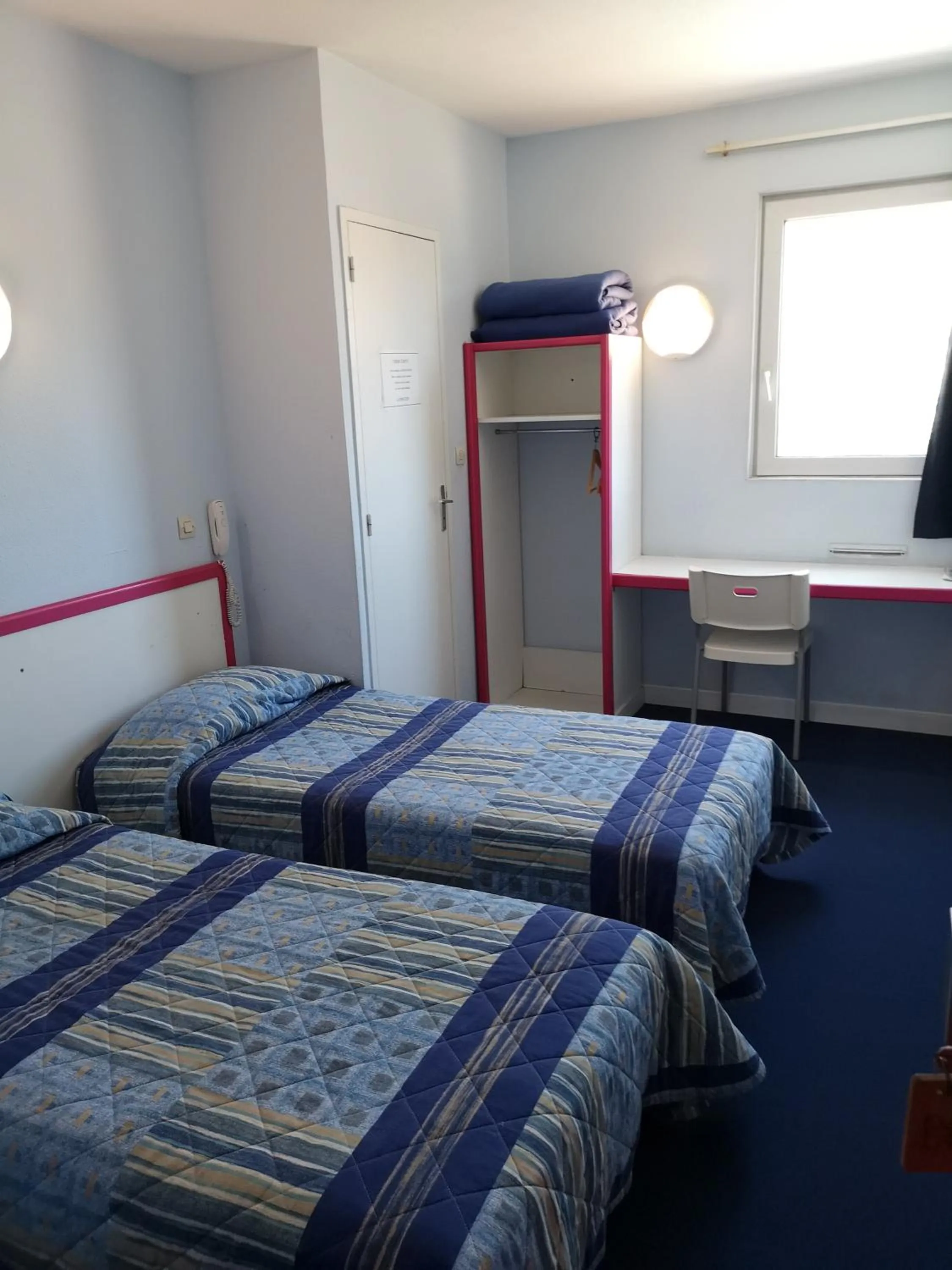 Bed in Hôtel Triotel