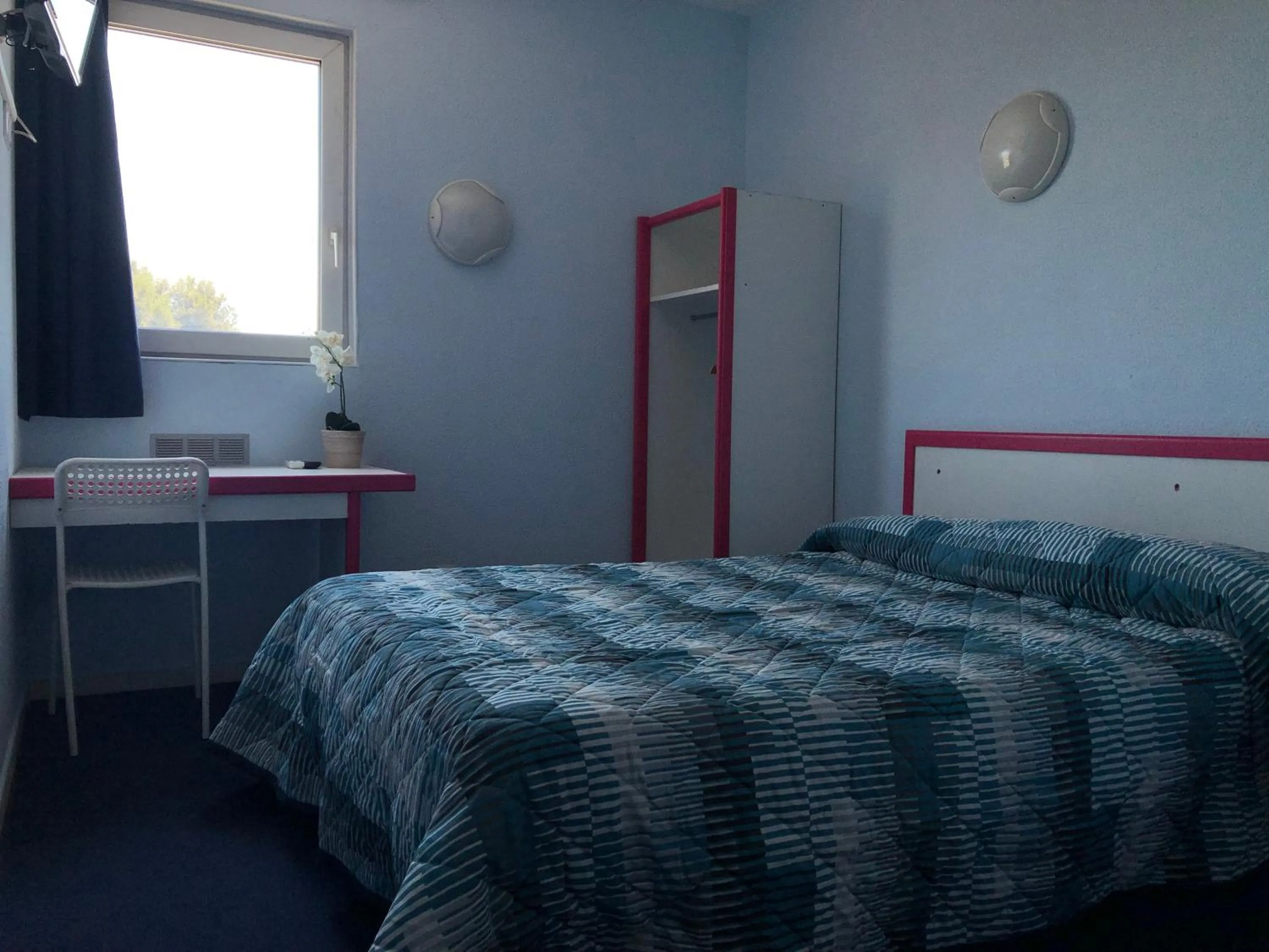 Bed in Hôtel Triotel