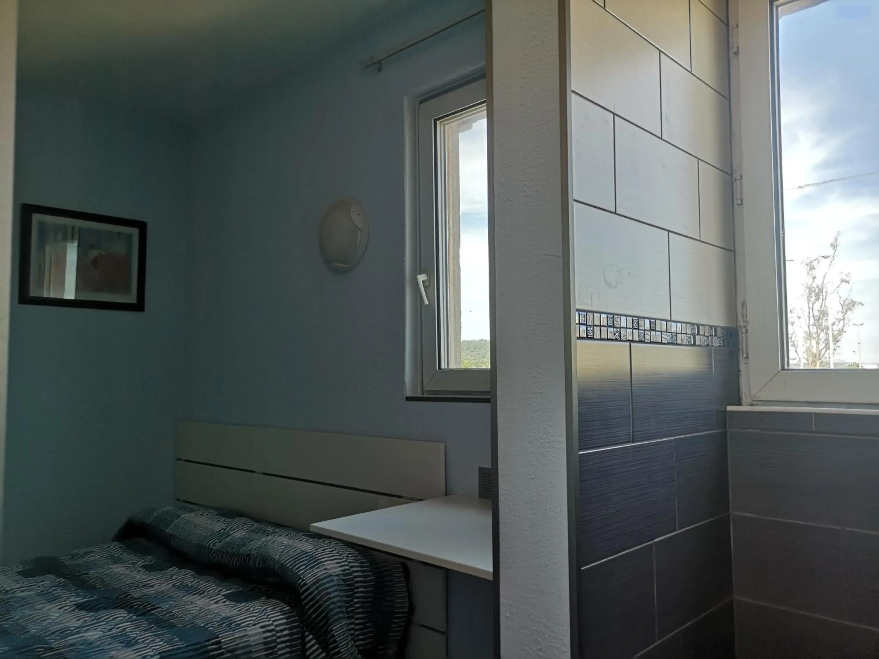 Bed in Hôtel Triotel Bed in Hôtel Triotel