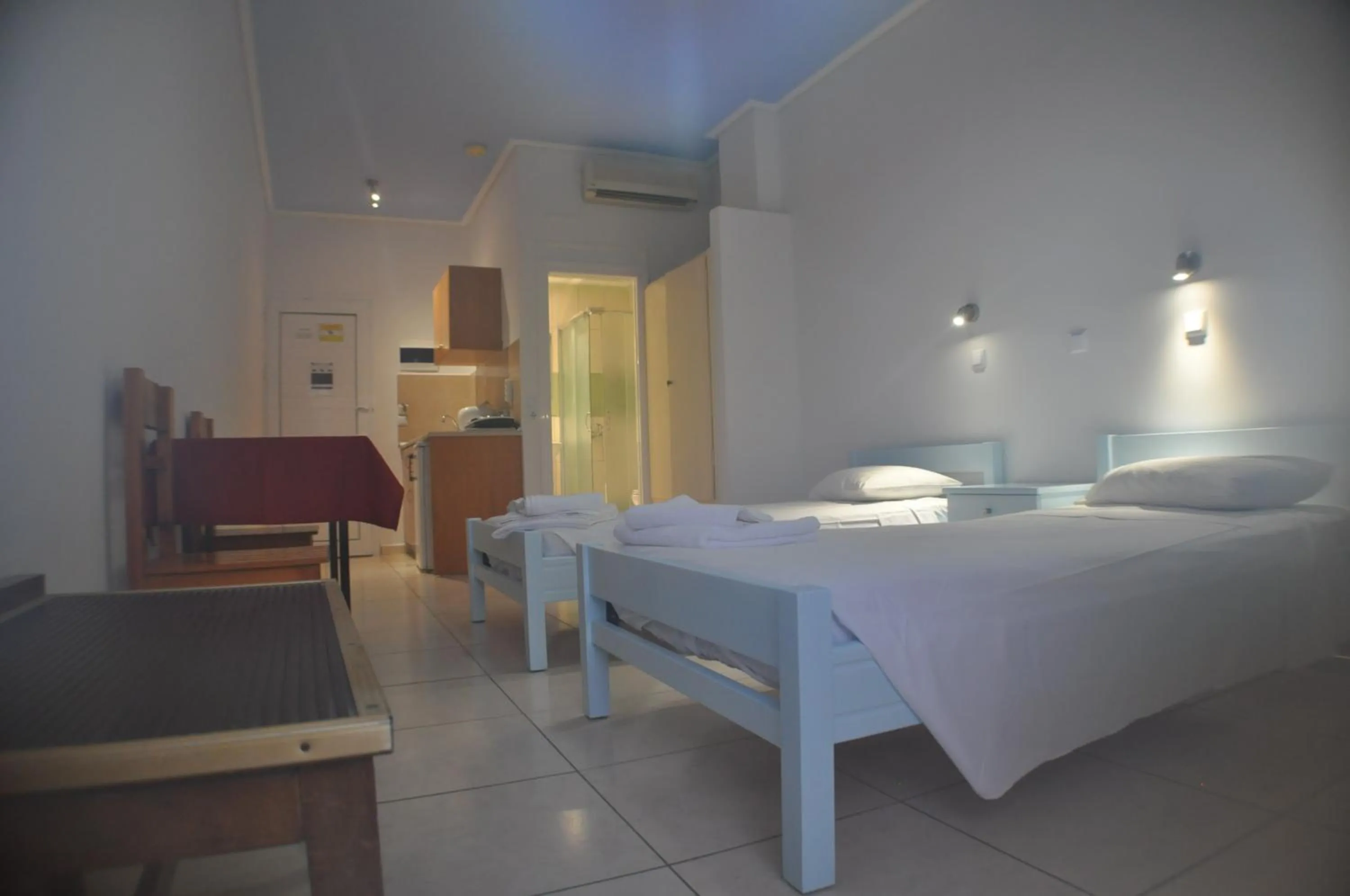 Bed in Zouboulia Apartments