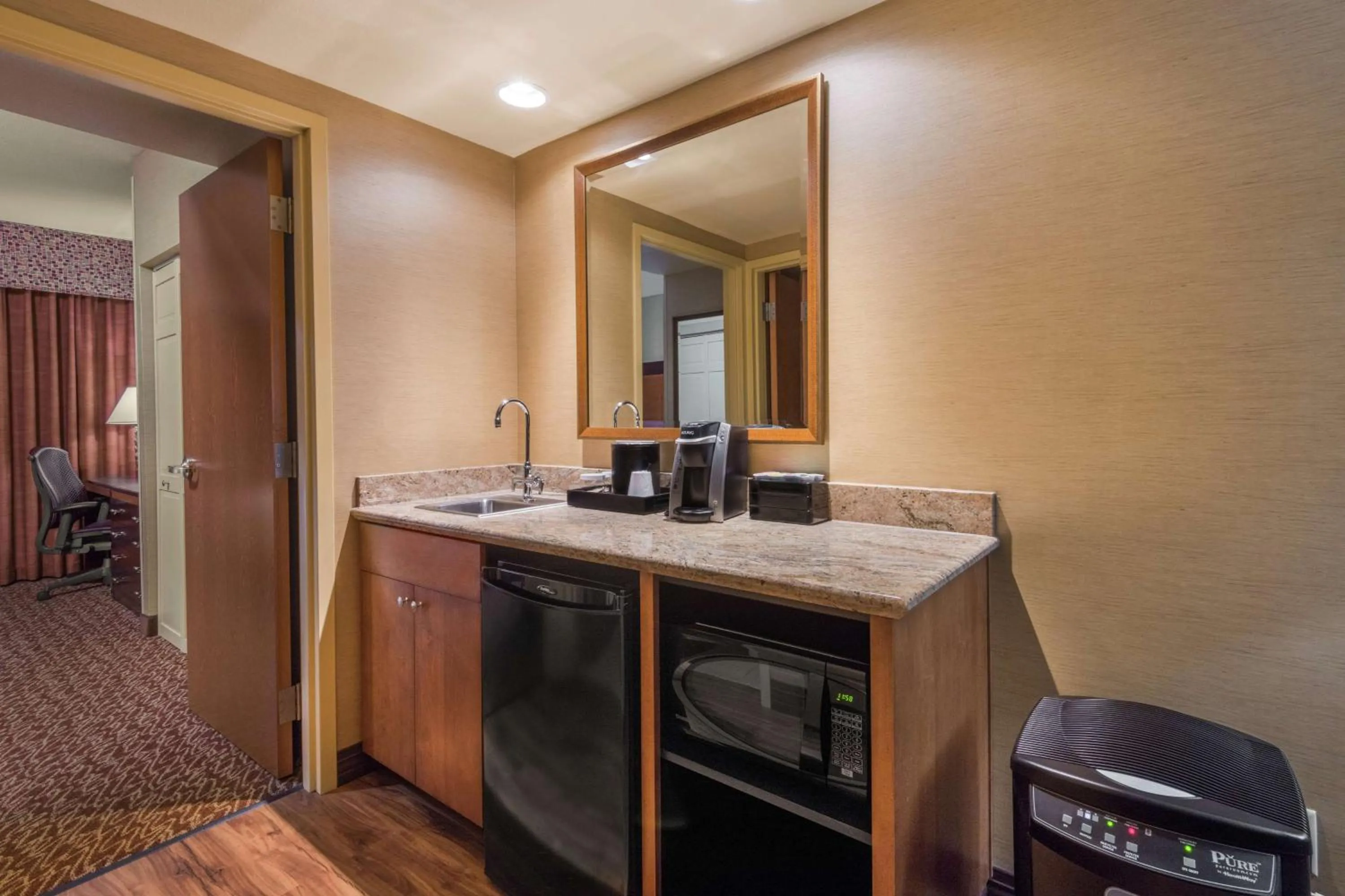 Kitchen or kitchenette in Embassy Suites Loveland Conference Center