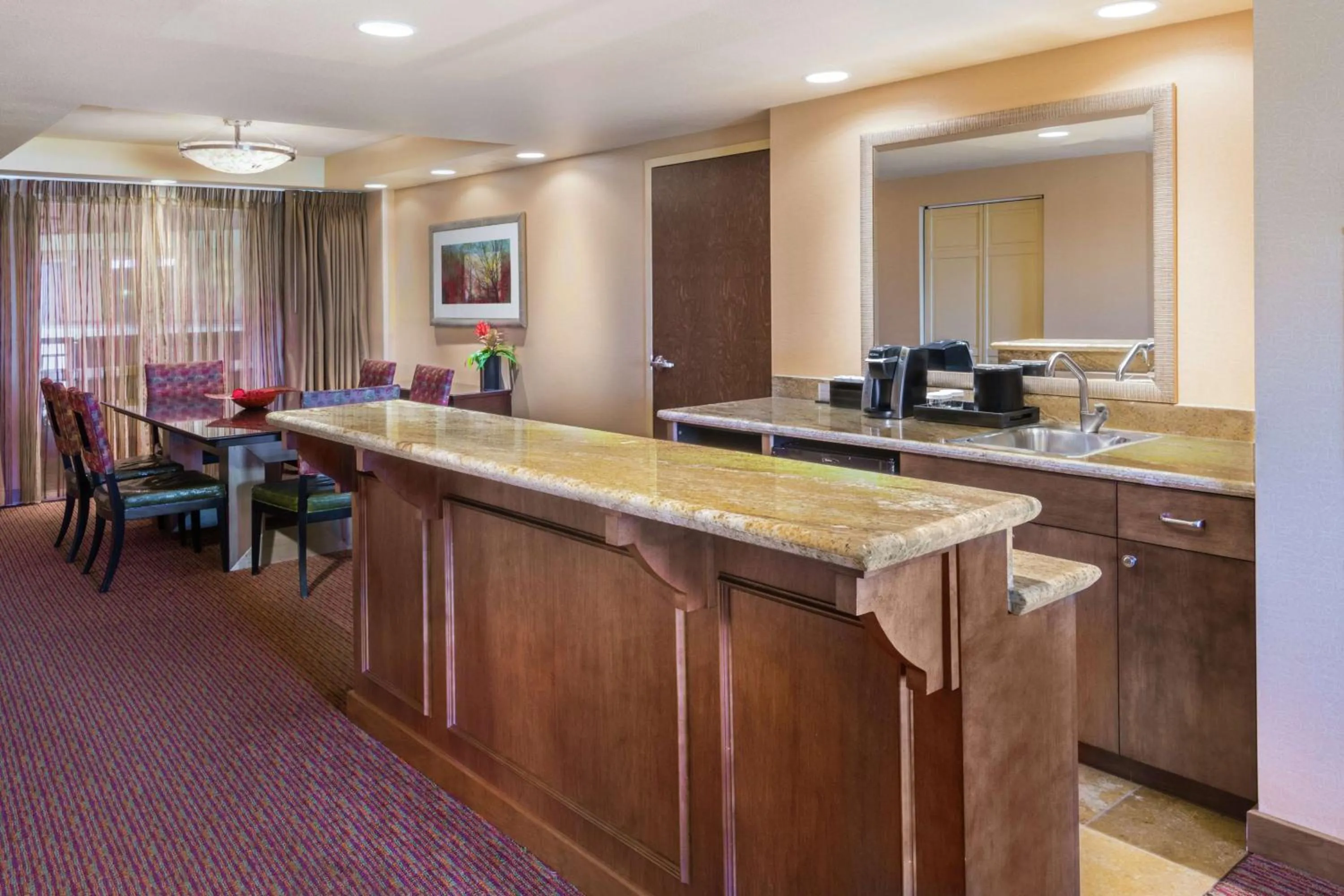 Kitchen or kitchenette in Embassy Suites Loveland Conference Center