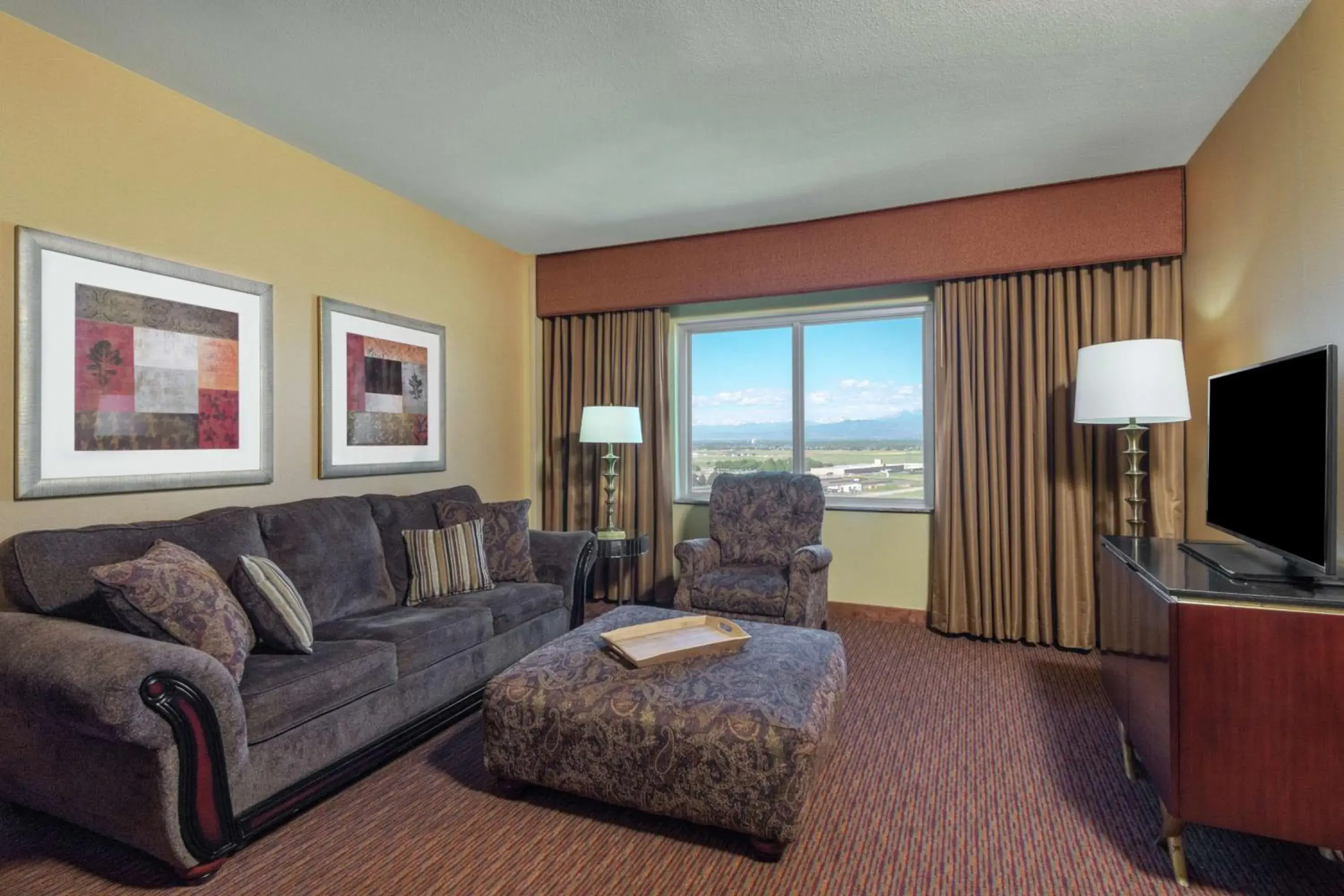 Living room in Embassy Suites Loveland Conference Center Living room in Embassy Suites Loveland Conference Center