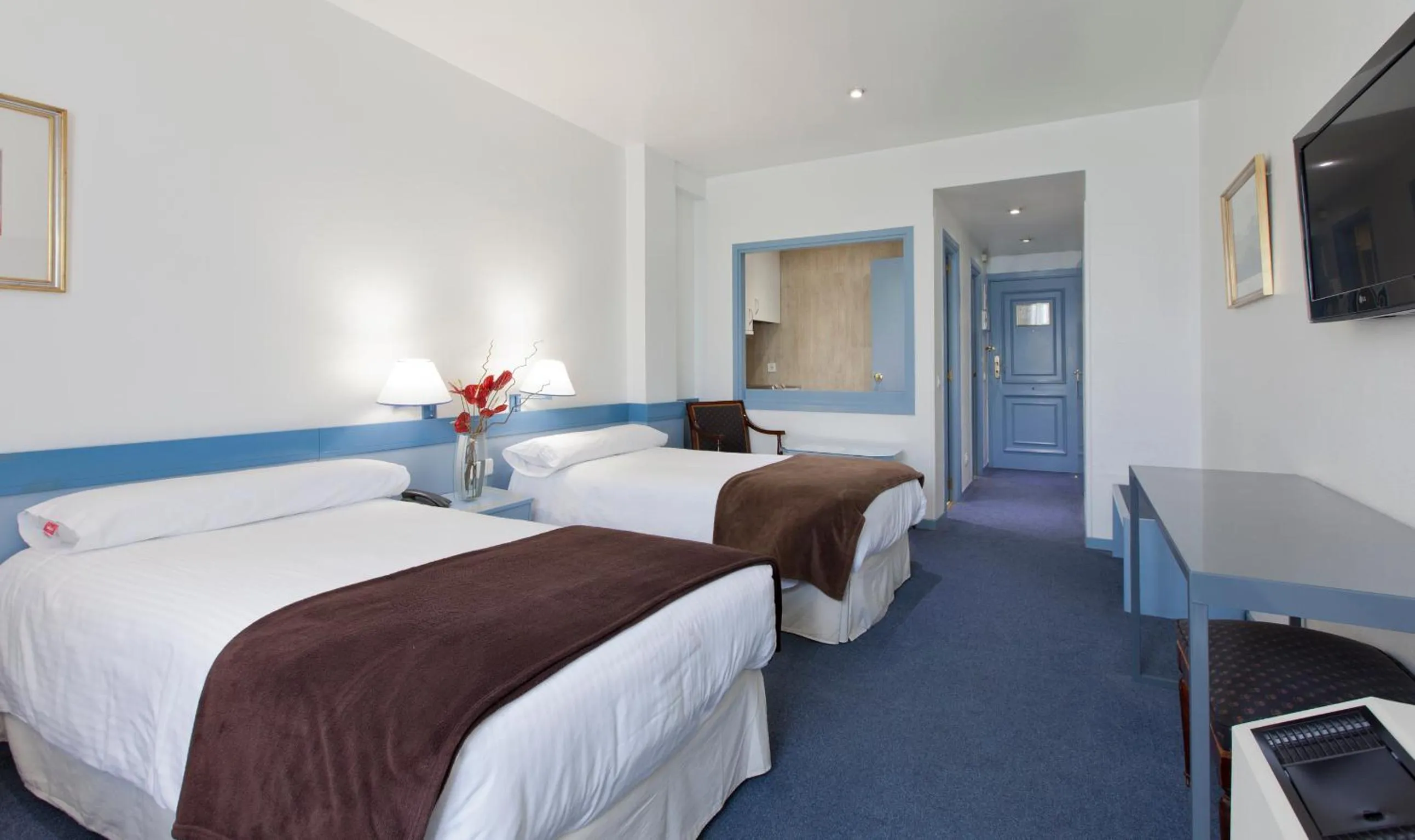 Bed in Espahotel Plaza de España