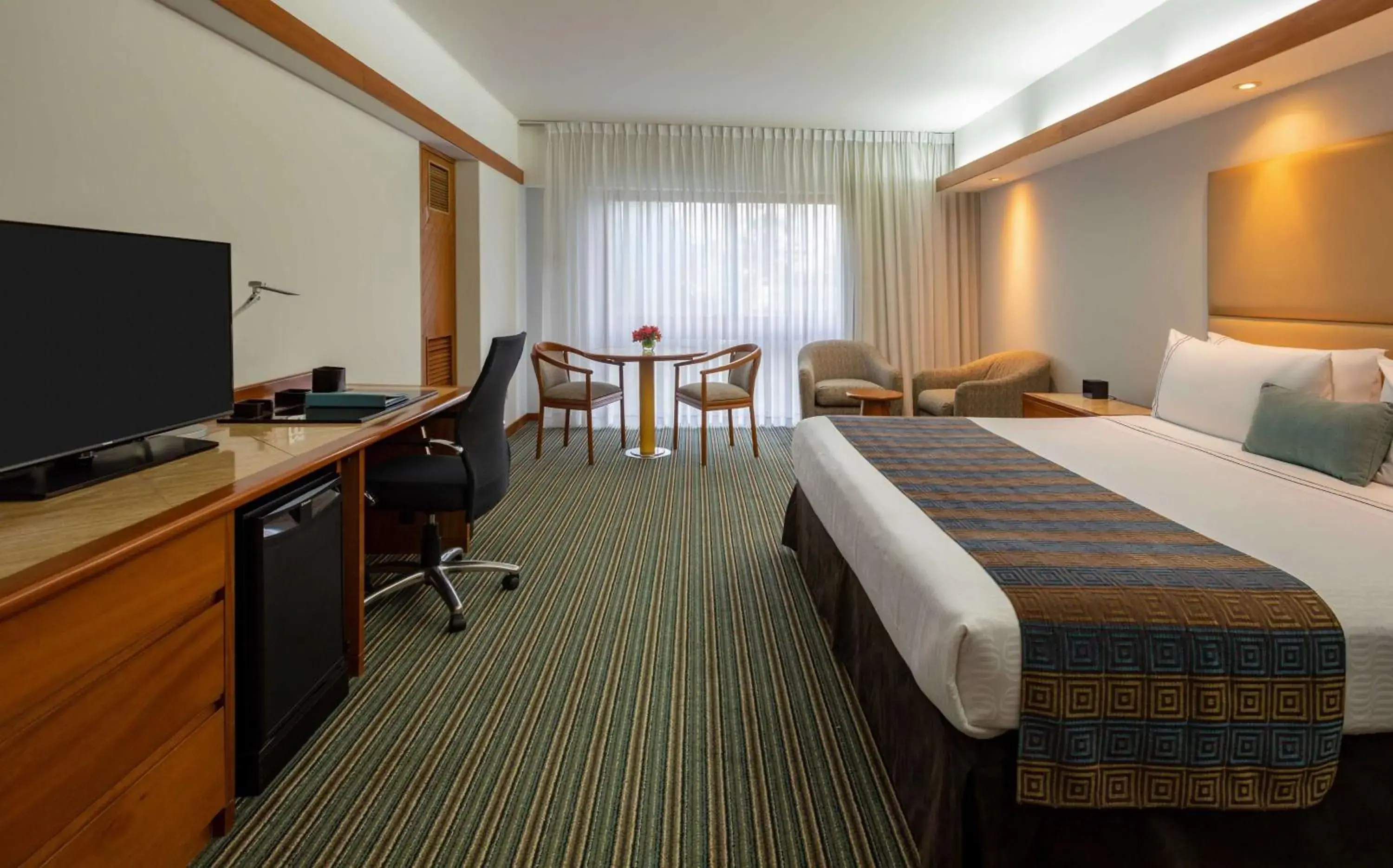 Photo of the whole room, Bed in Sonesta Hotel El Olivar Photo of the whole room, Bed in Sonesta Hotel El Olivar