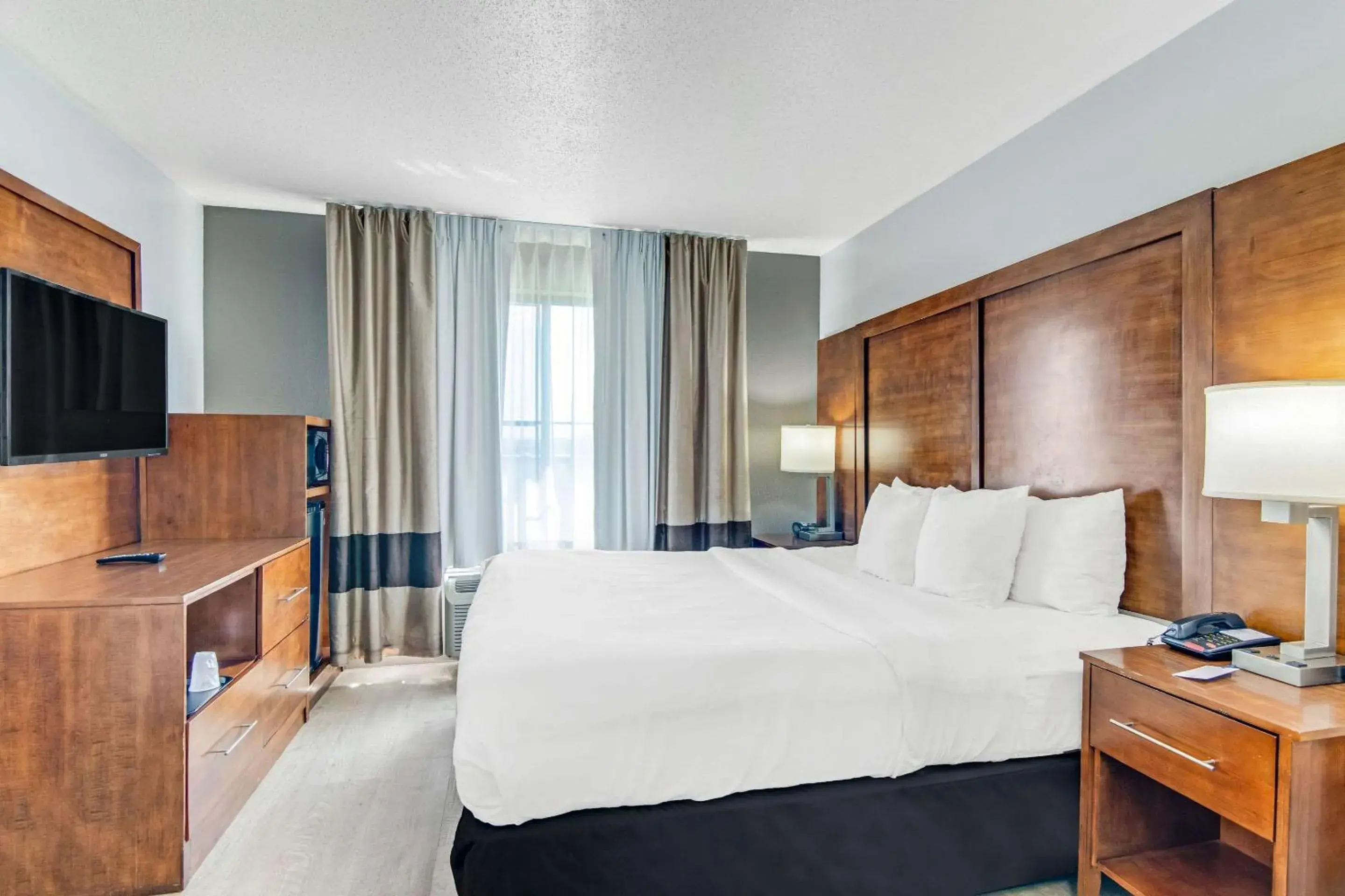 Bedroom, Bed in Comfort Suites near I-80 and I-94 Bedroom, Bed in Comfort Suites near I-80 and I-94