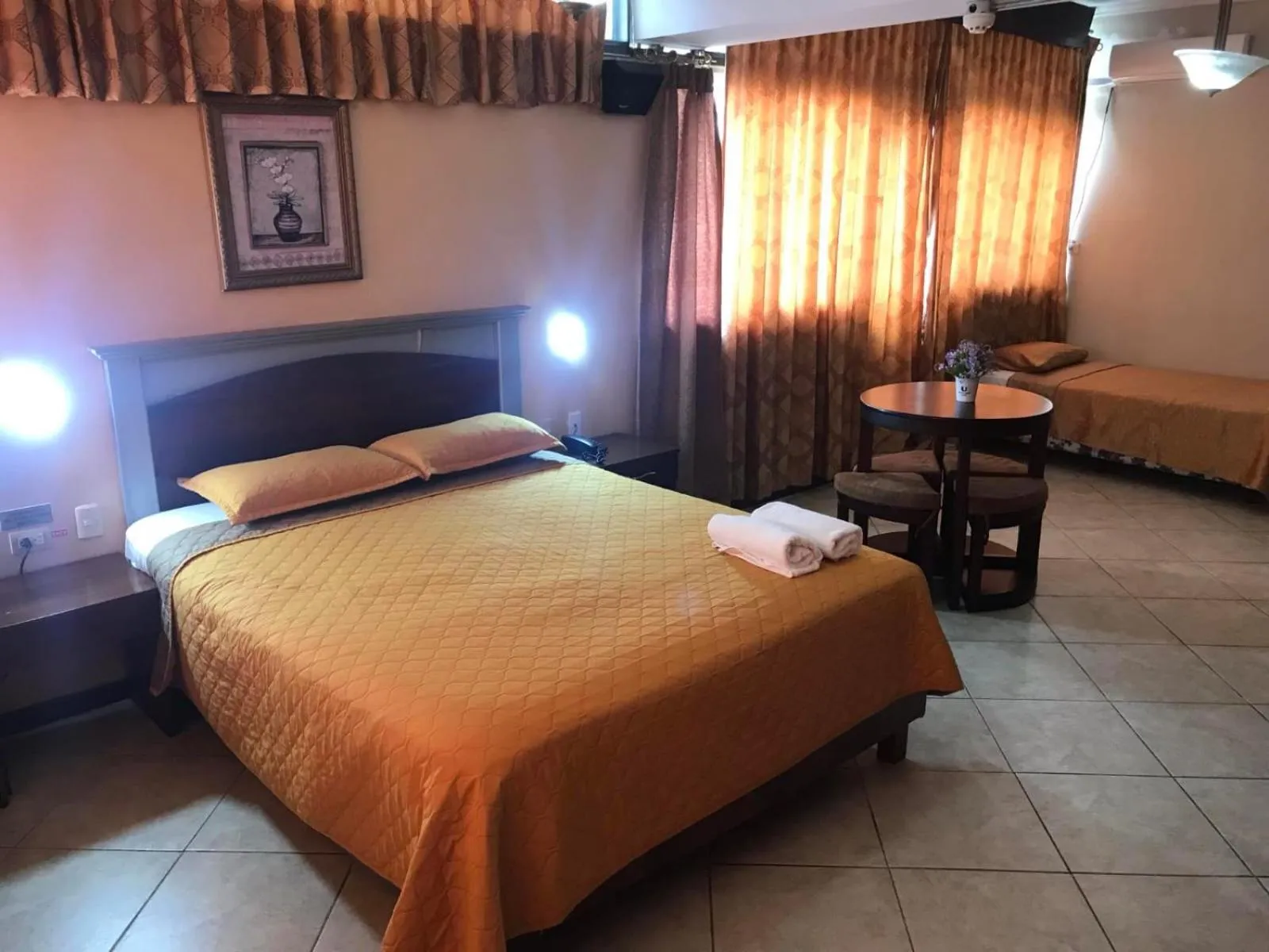 Bed in Hotel Malecon Inn