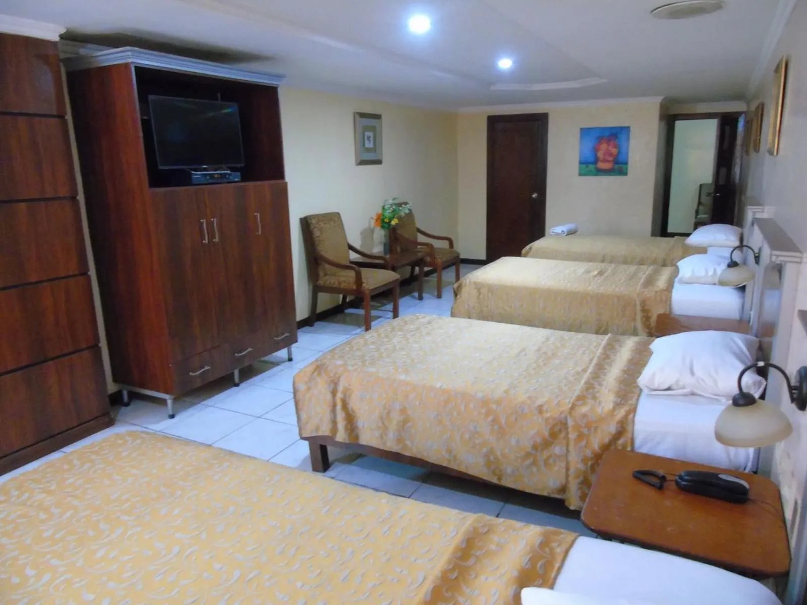 Bed in Hotel Malecon Inn