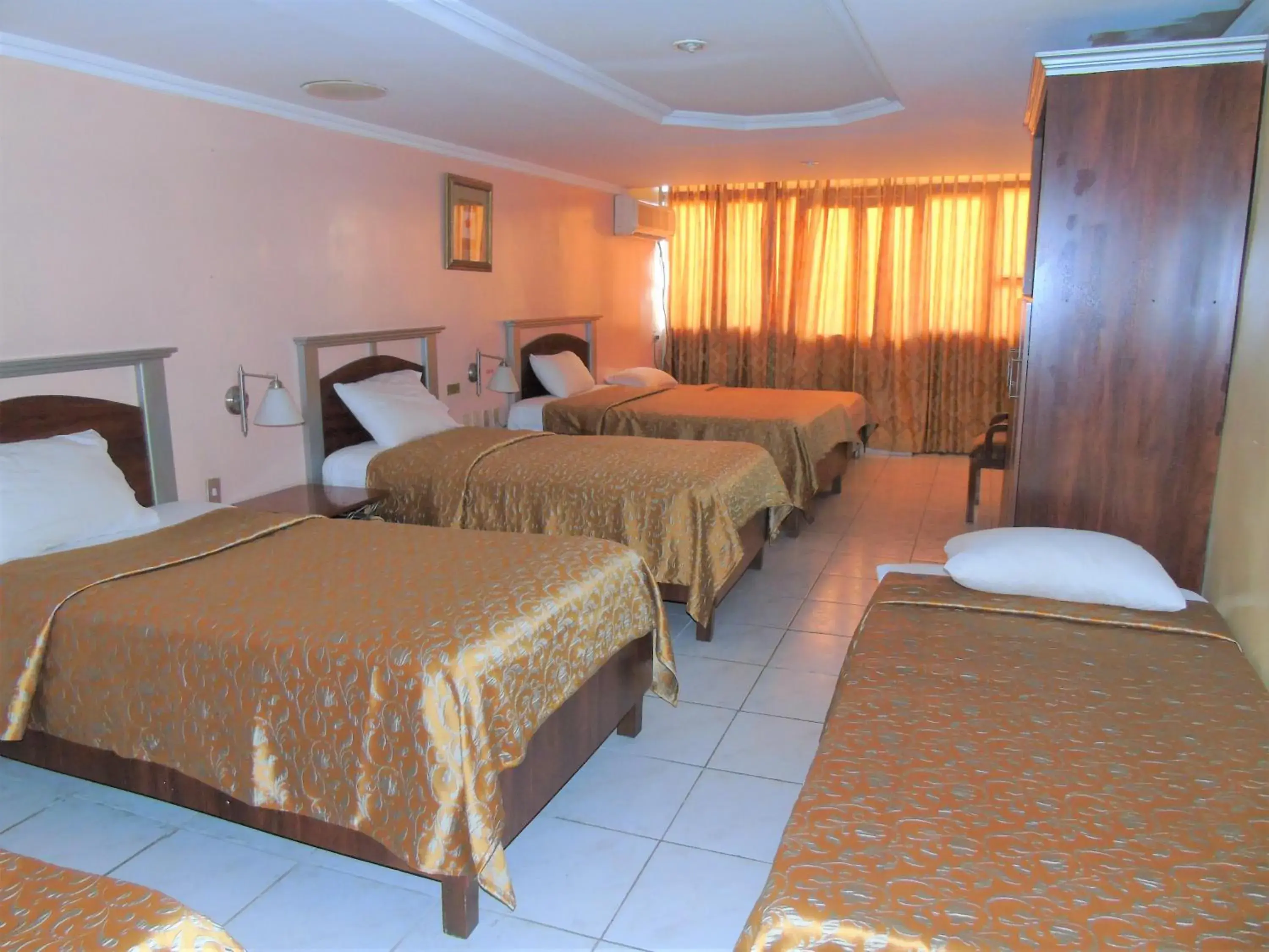 Bed in Hotel Malecon Inn Bed in Hotel Malecon Inn