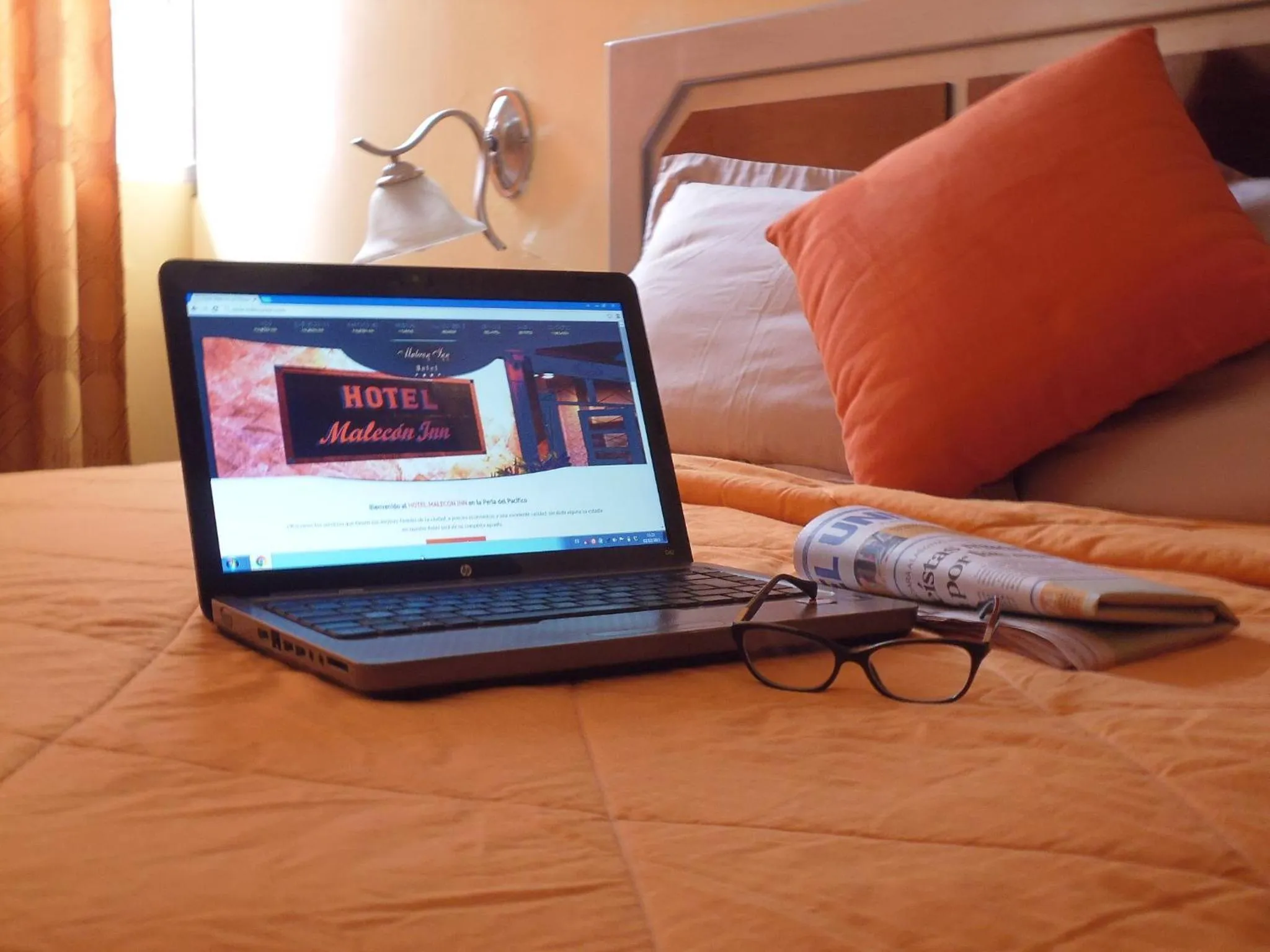 Bed in Hotel Malecon Inn