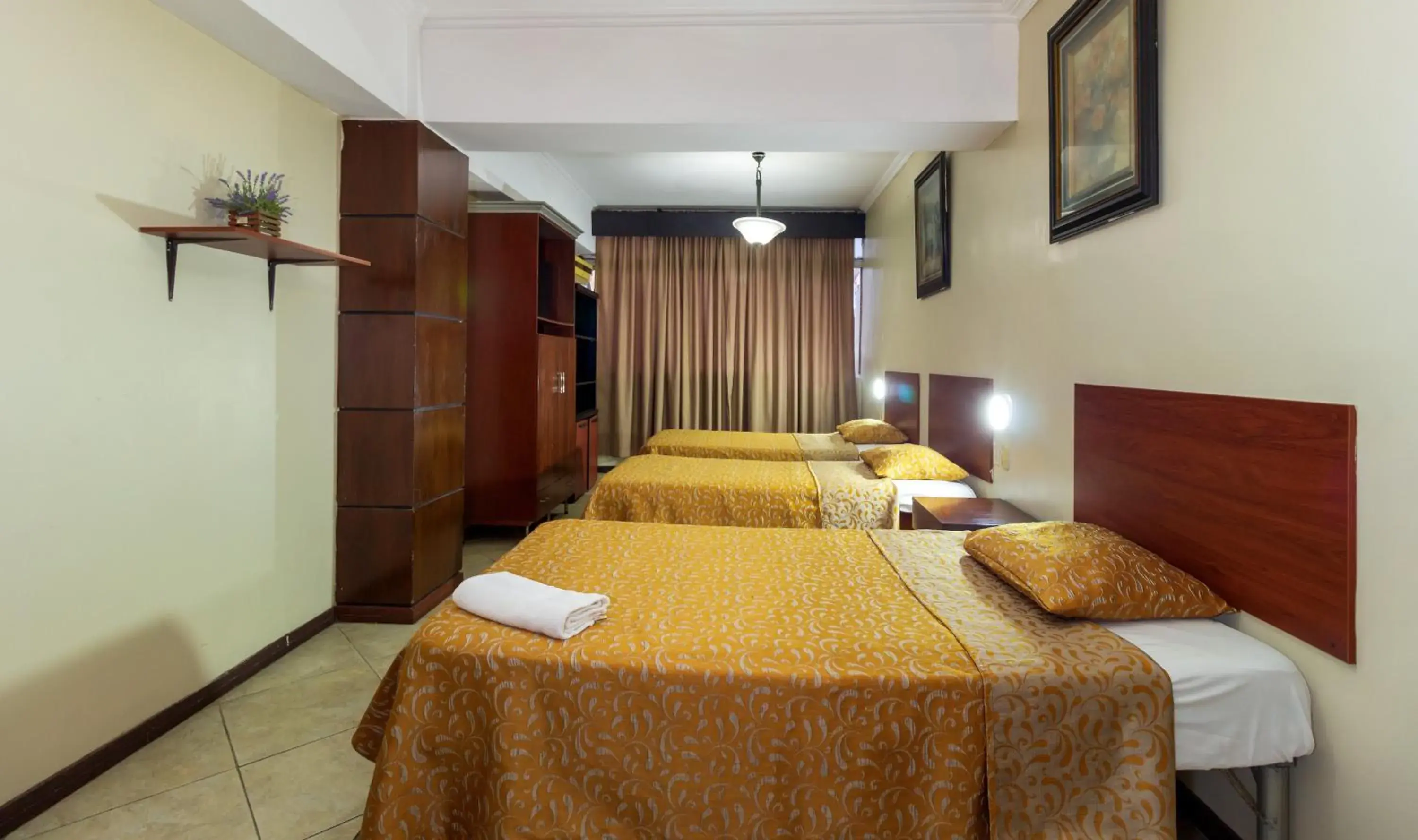 Photo of the whole room, Bed in Hotel Malecon Inn Photo of the whole room, Bed in Hotel Malecon Inn