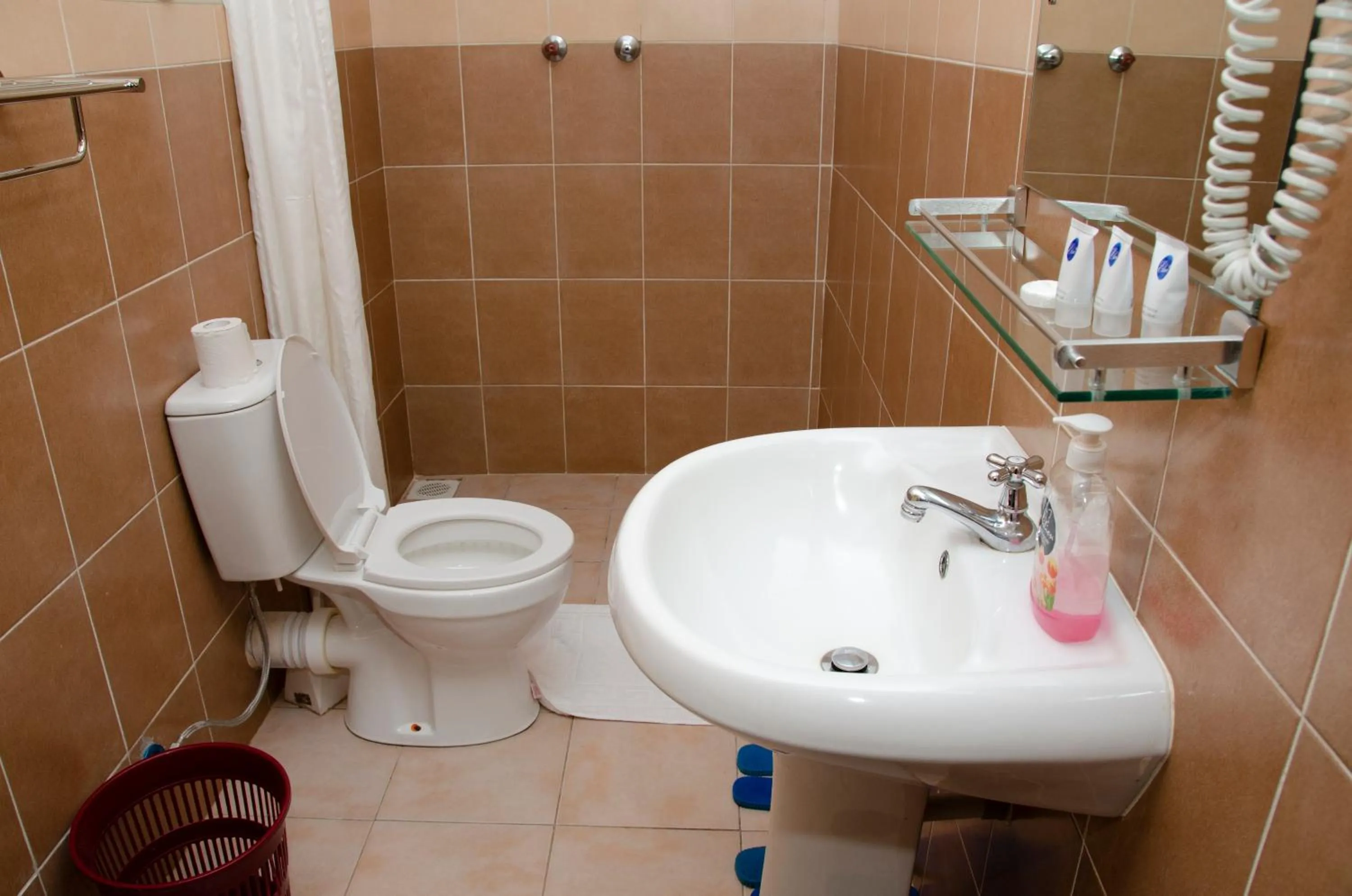 Bathroom in The Noble Hotel & Conference Centre