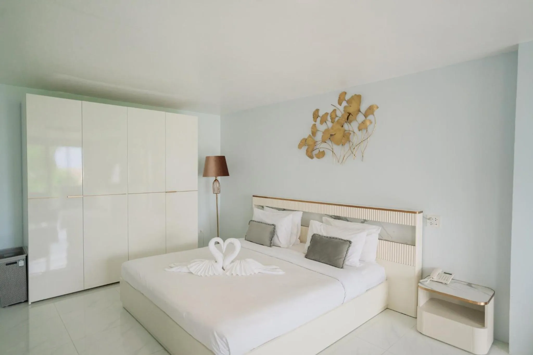 Bed in Club Bamboo Boutique Patong Beach Resort