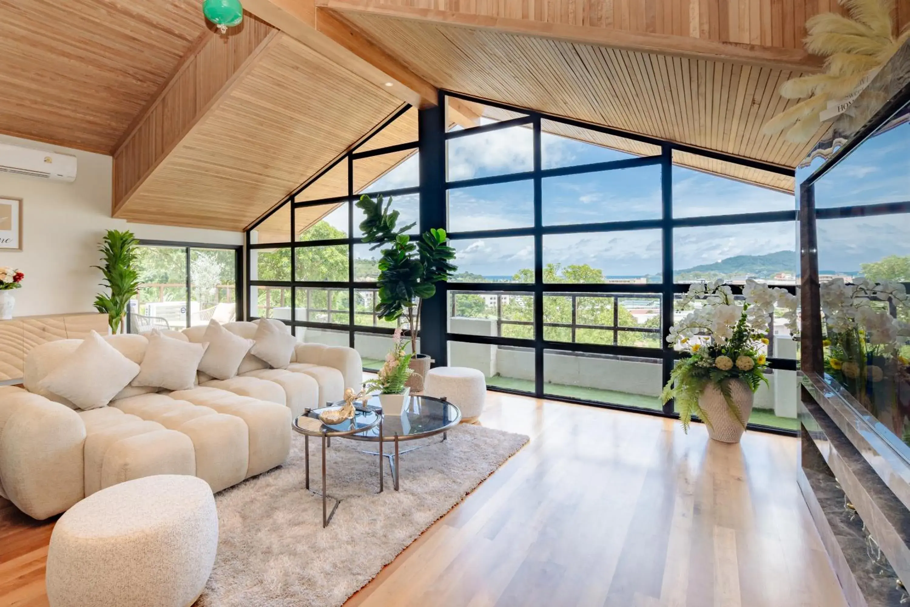 Living room in Club Bamboo Boutique Patong Beach Resort Living room in Club Bamboo Boutique Patong Beach Resort