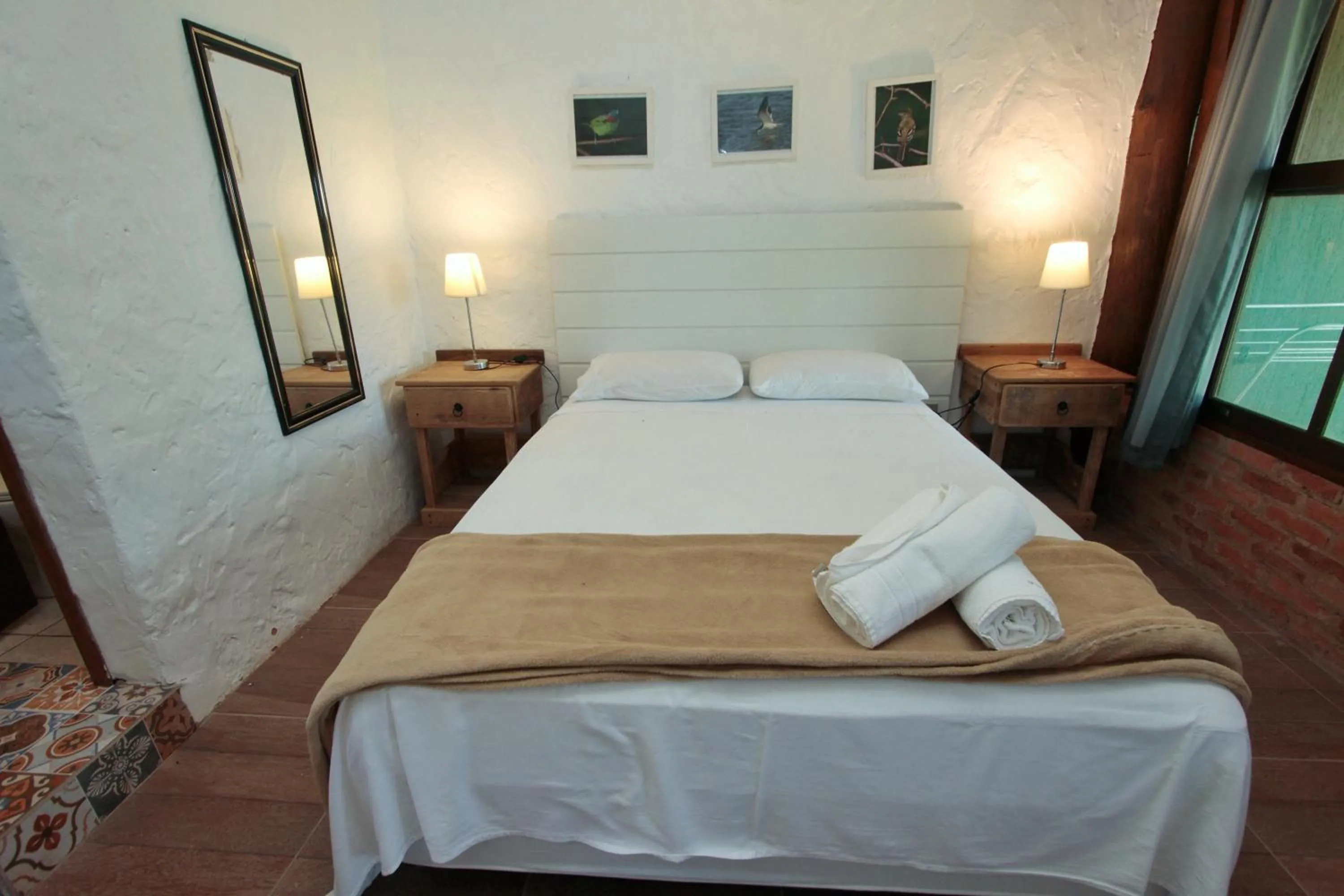 Bed in Pousada Paraíso do Luz