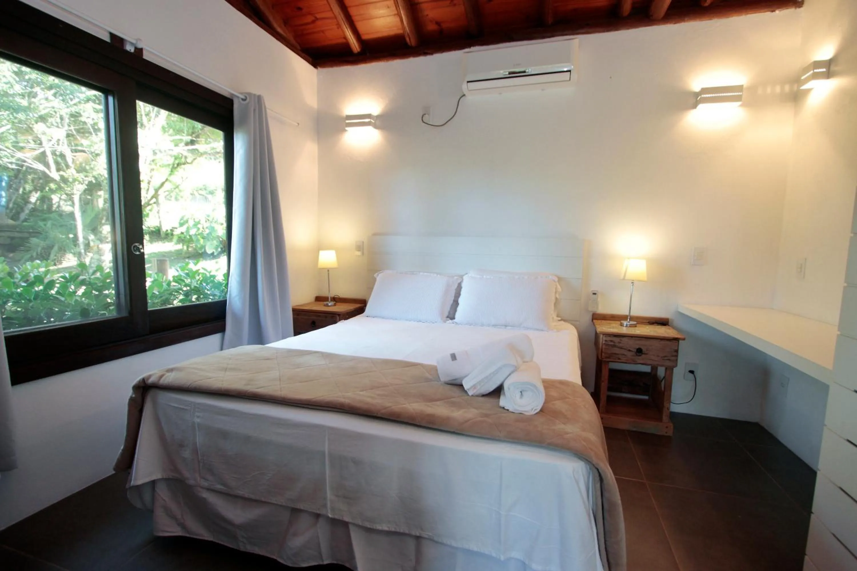 Bed in Pousada Paraíso do Luz