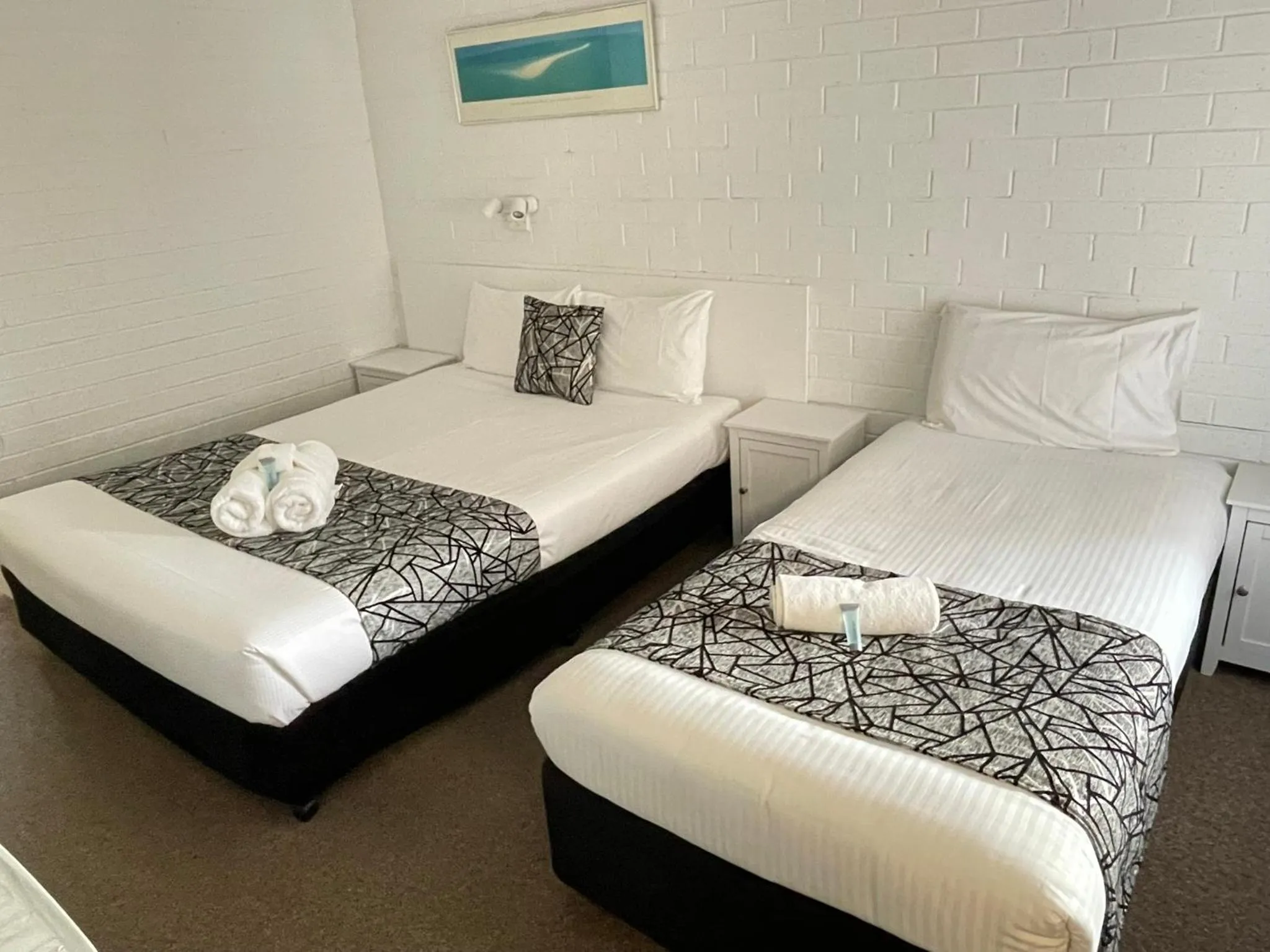 Bed in Coastal Bay Motel