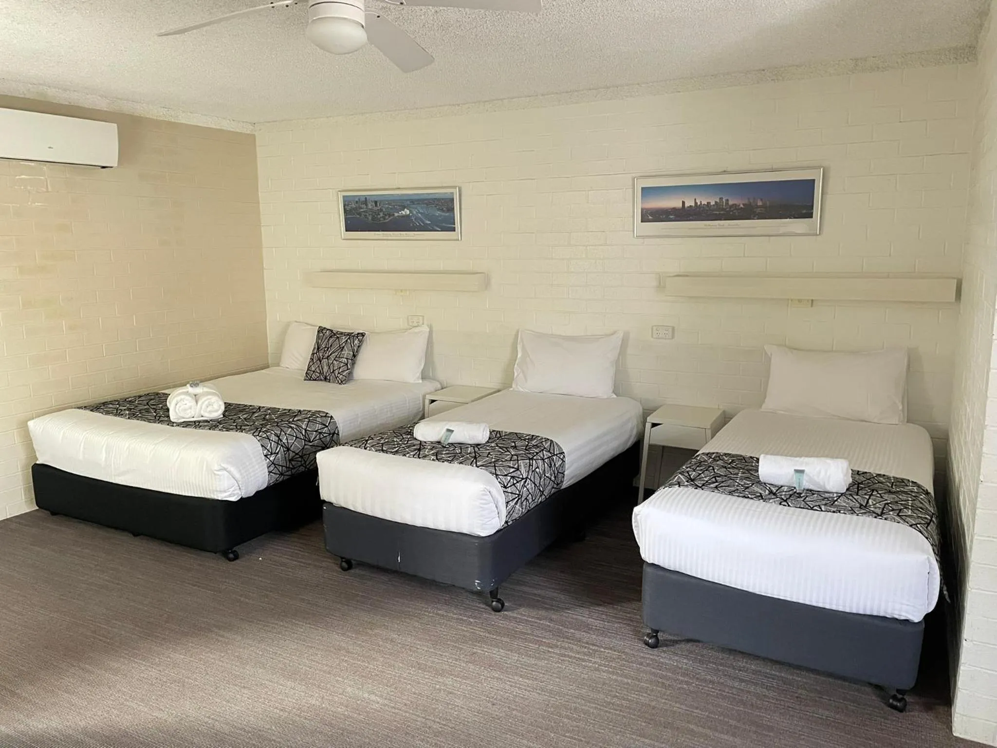 Bed in Coastal Bay Motel