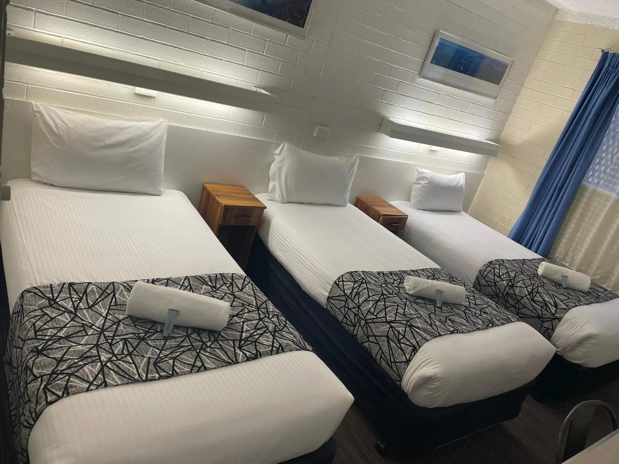 Bed in Coastal Bay Motel