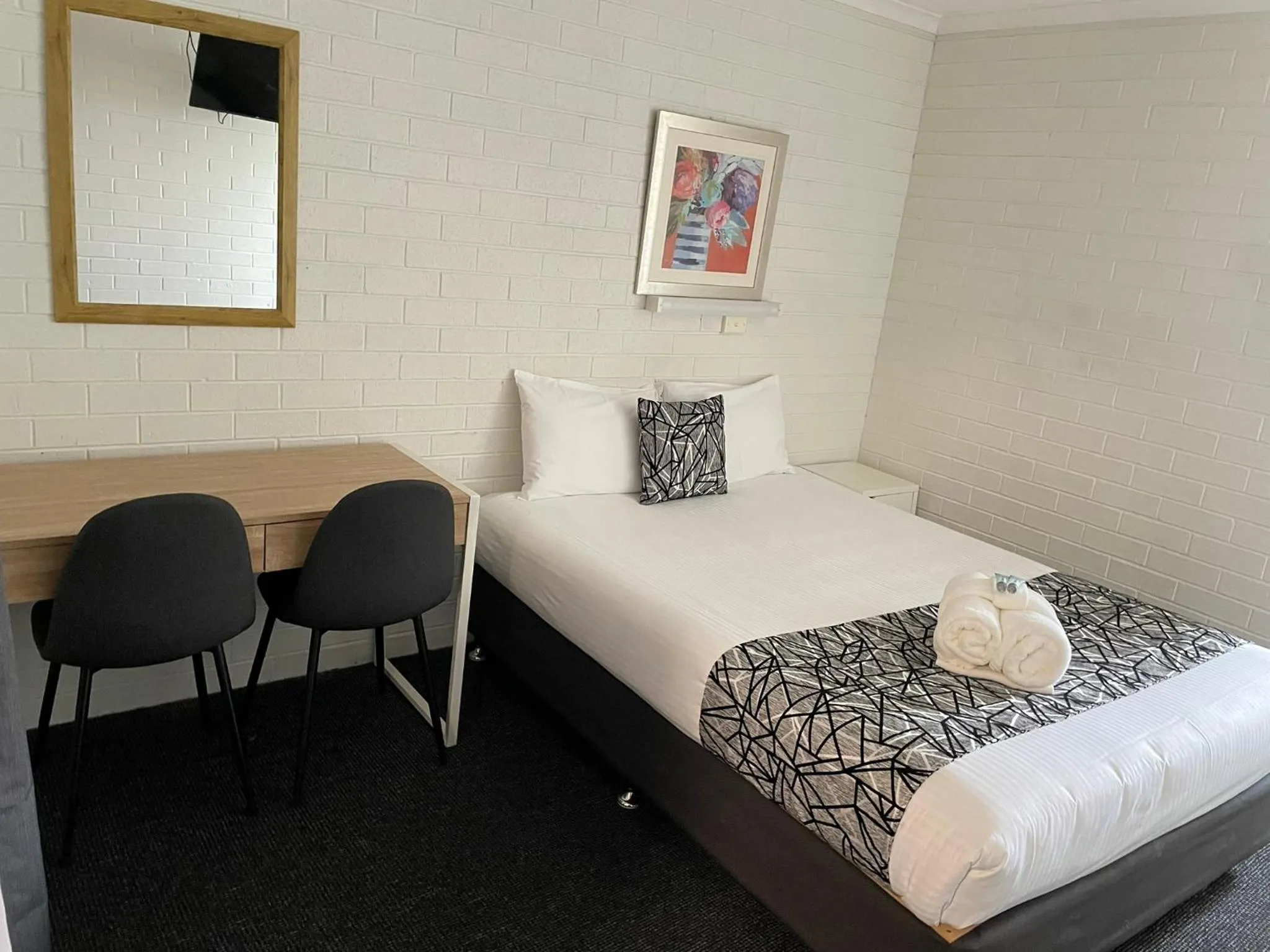 Bed in Coastal Bay Motel